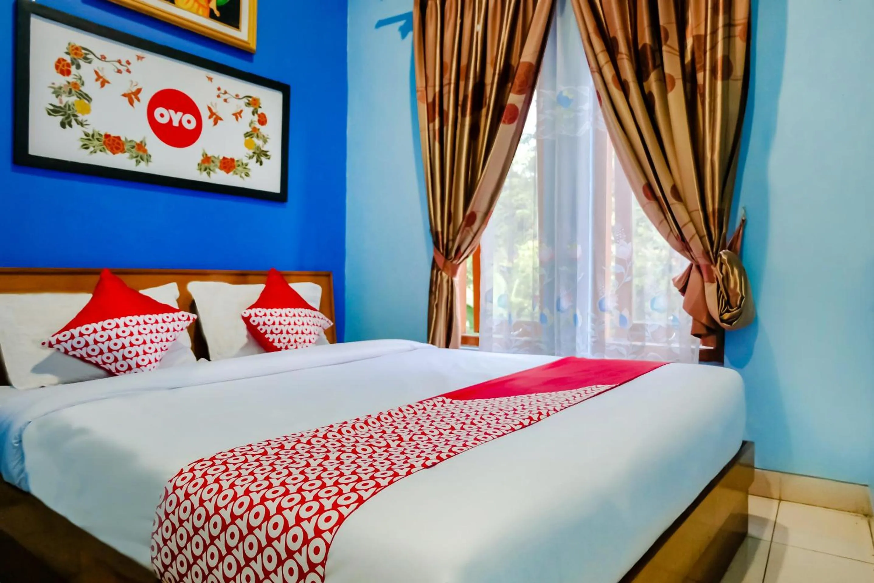 Bedroom, Bed in Hotel O Guest House Amalia Malang