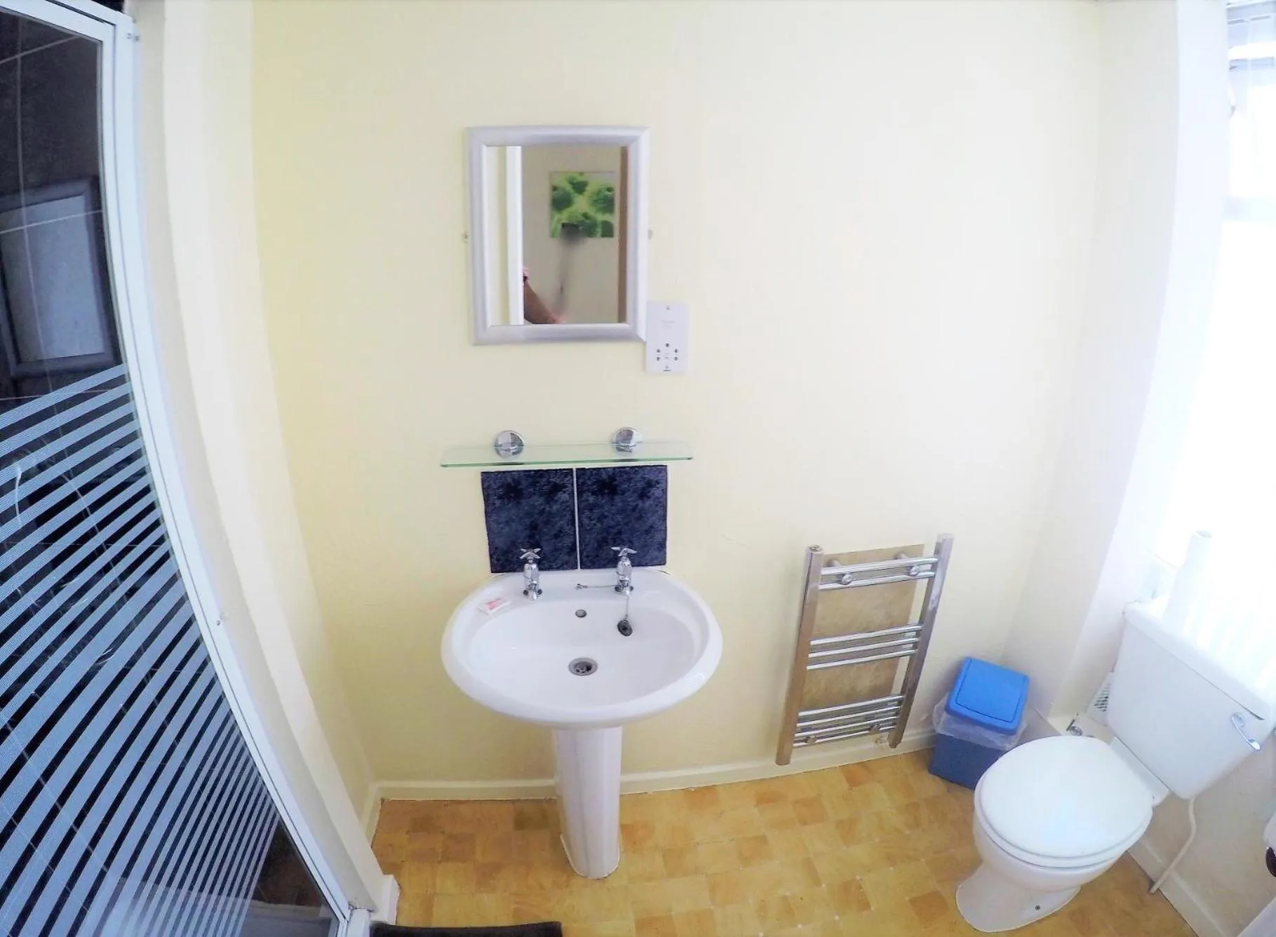 Shower in Tudor Rose Hotel