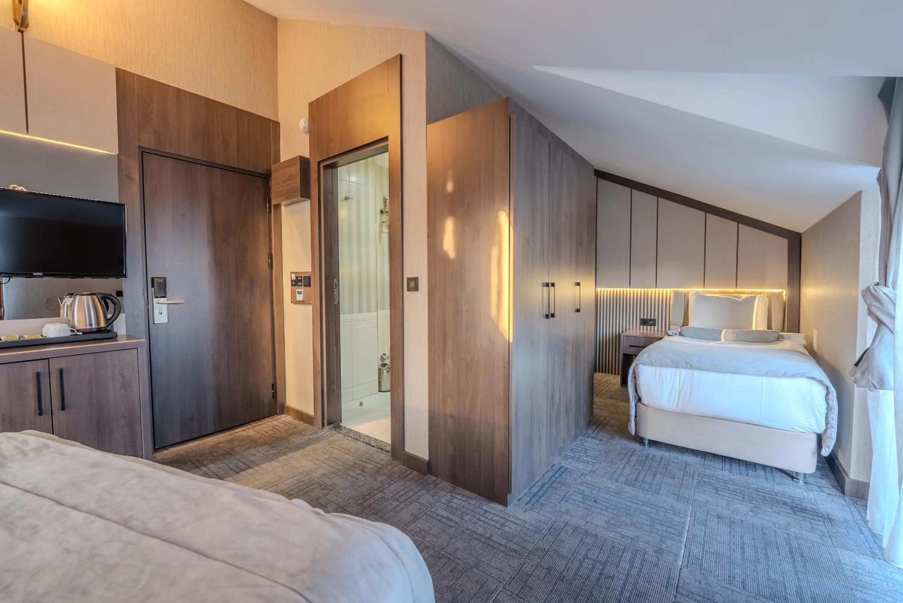 Photo of the whole room, Bed in BEST GARDEN HOTEL