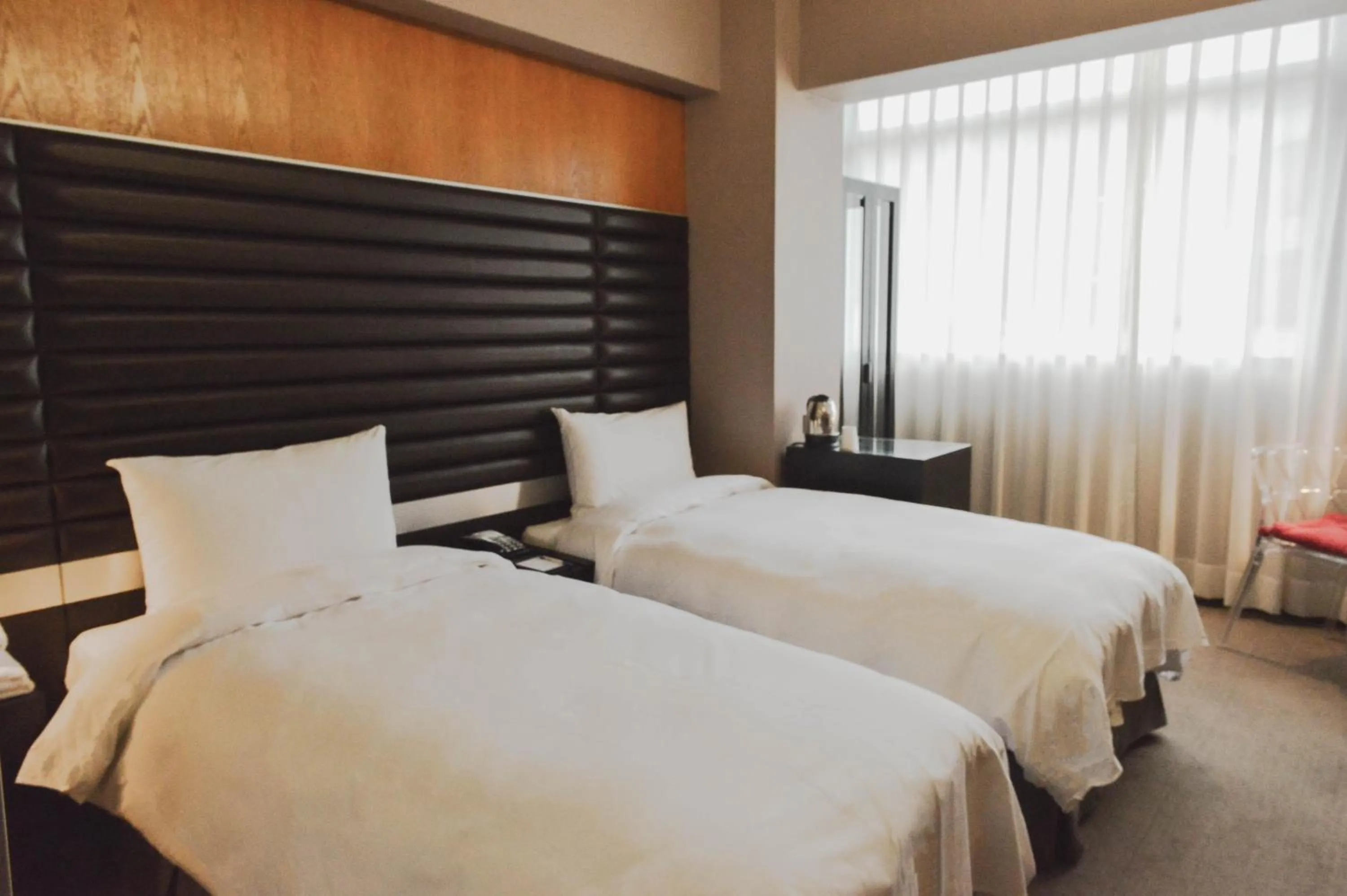 Bed in 新麗旅店 Newful Hotel