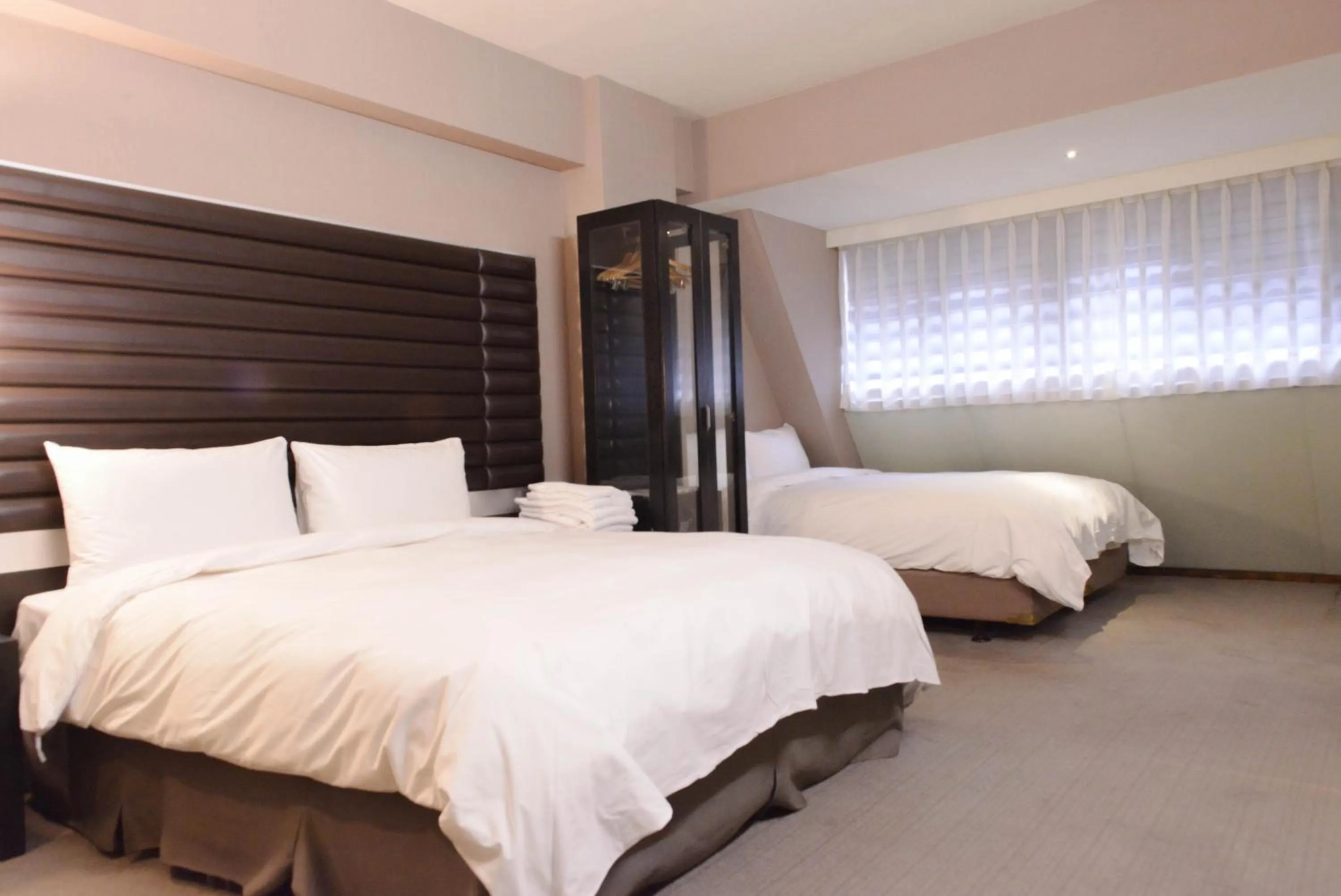 Bed in 新麗旅店 Newful Hotel