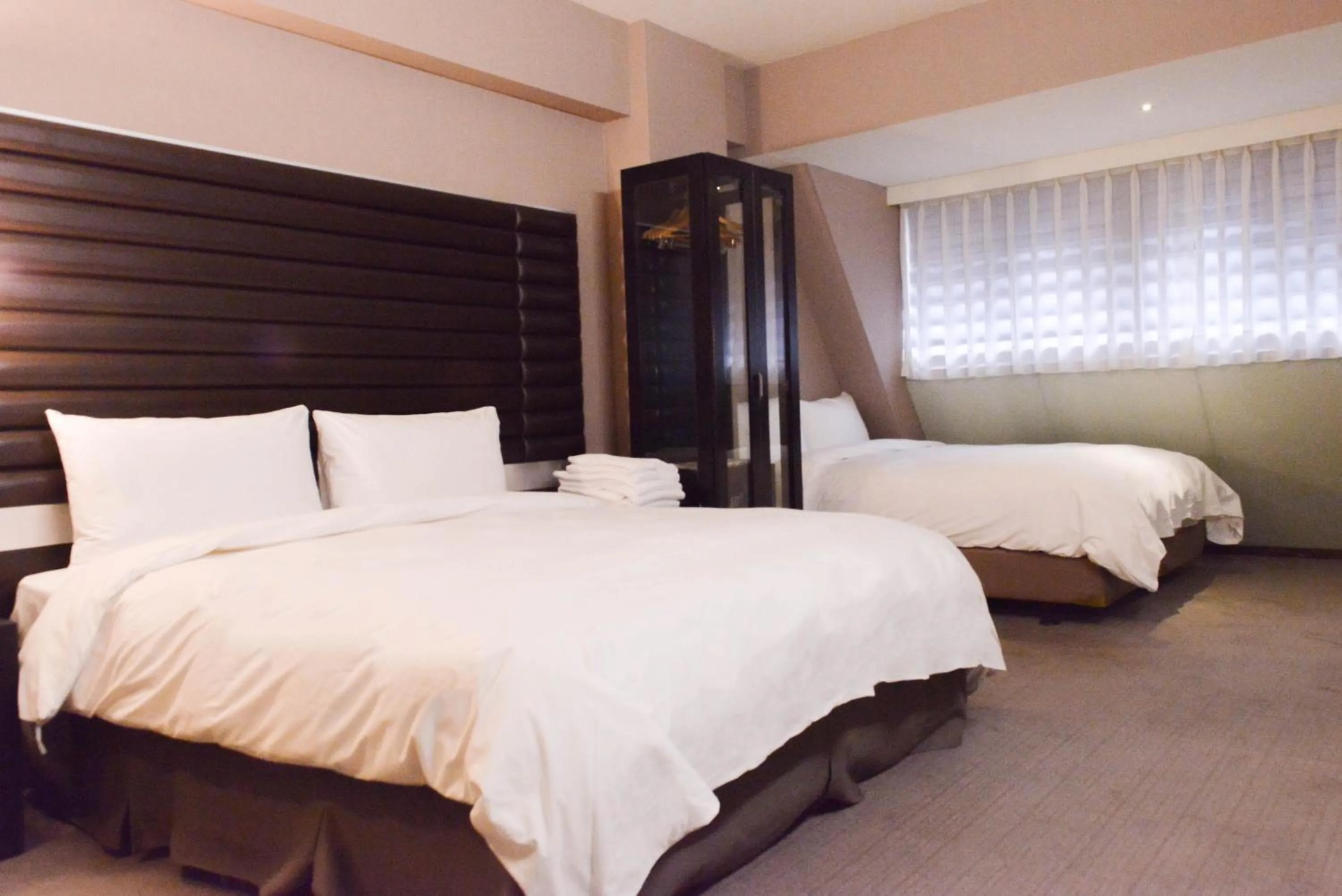 Bed in 新麗旅店 Newful Hotel