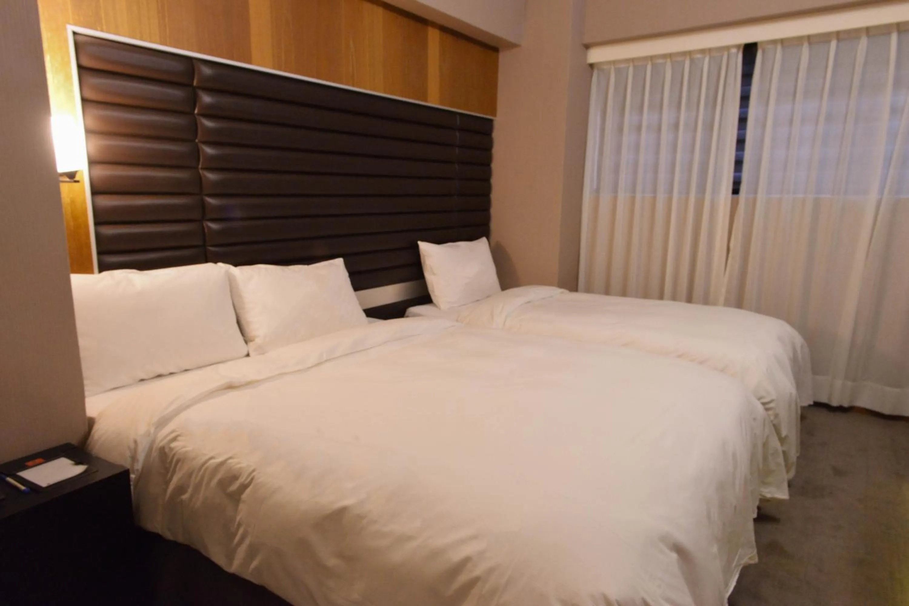 Bed in 新麗旅店 Newful Hotel