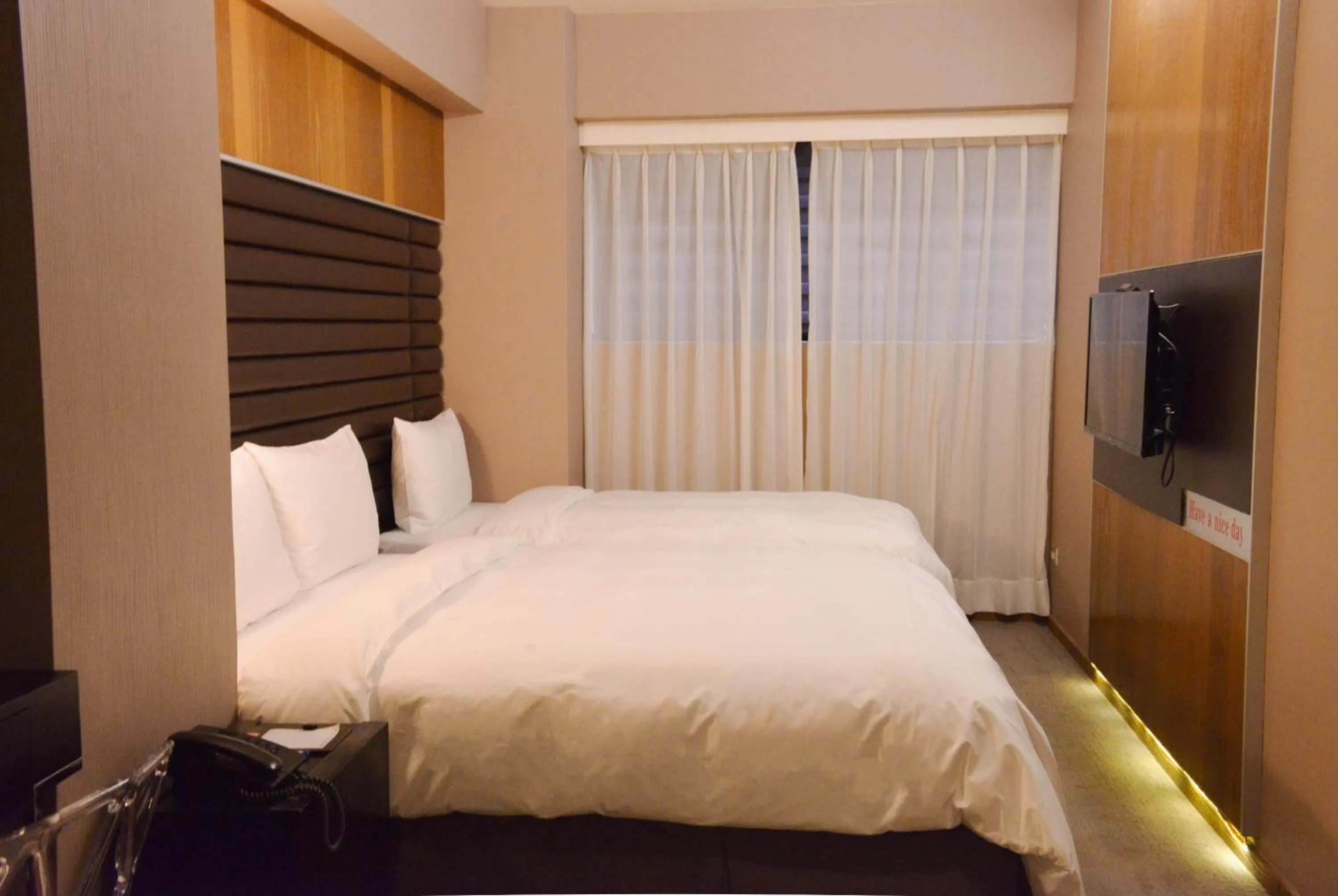 Bed in 新麗旅店 Newful Hotel