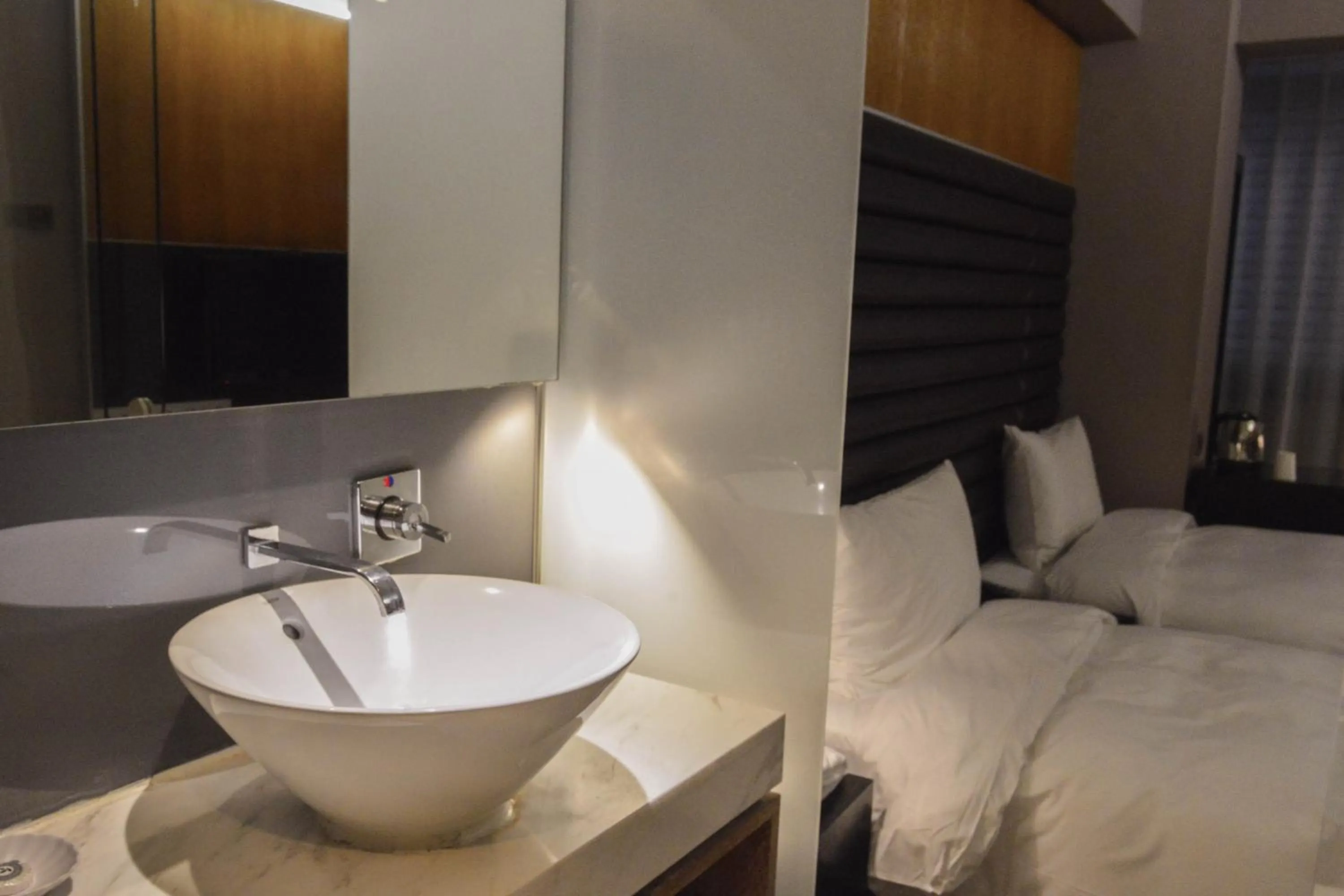 Bed in 新麗旅店 Newful Hotel