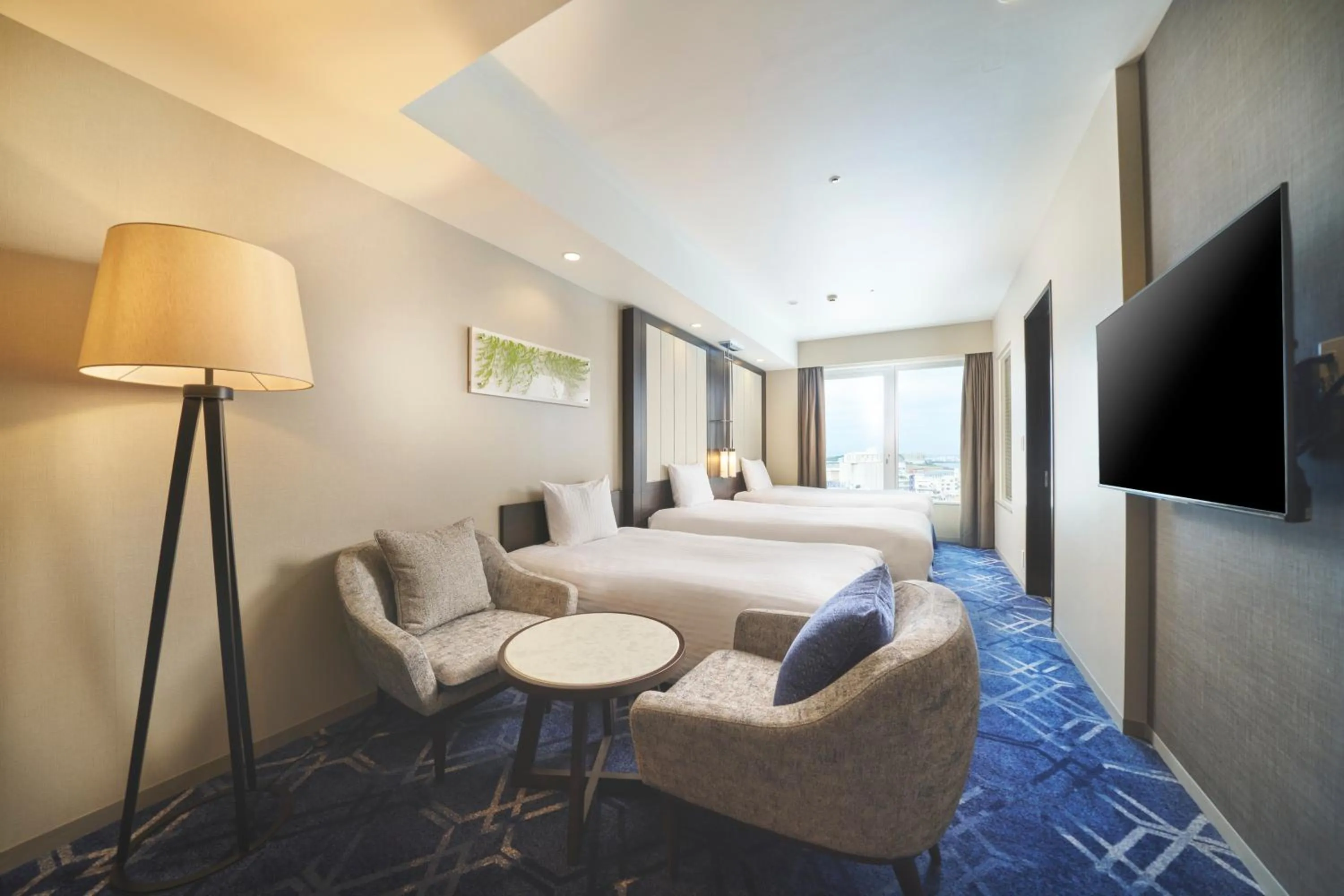 Photo of the whole room, Bed in Rihga Royal Gran Okinawa