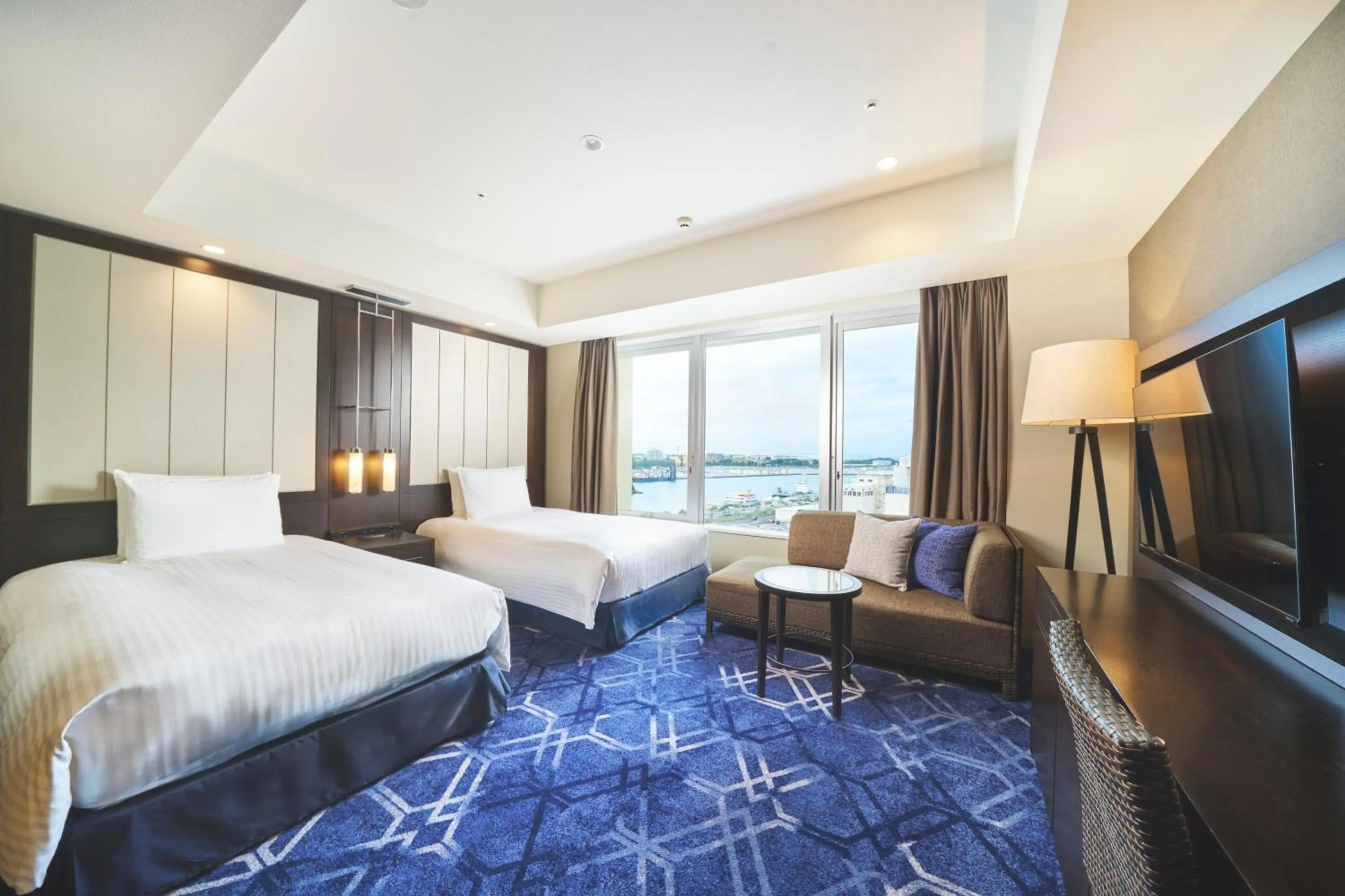 Photo of the whole room, Bed in Rihga Royal Gran Okinawa