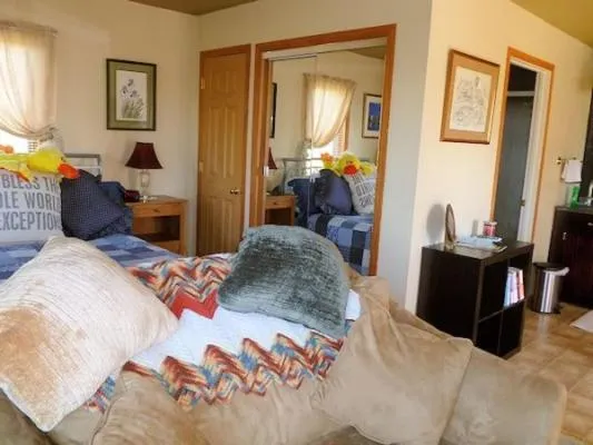 Bed in Belle Aire Mansion Guest House