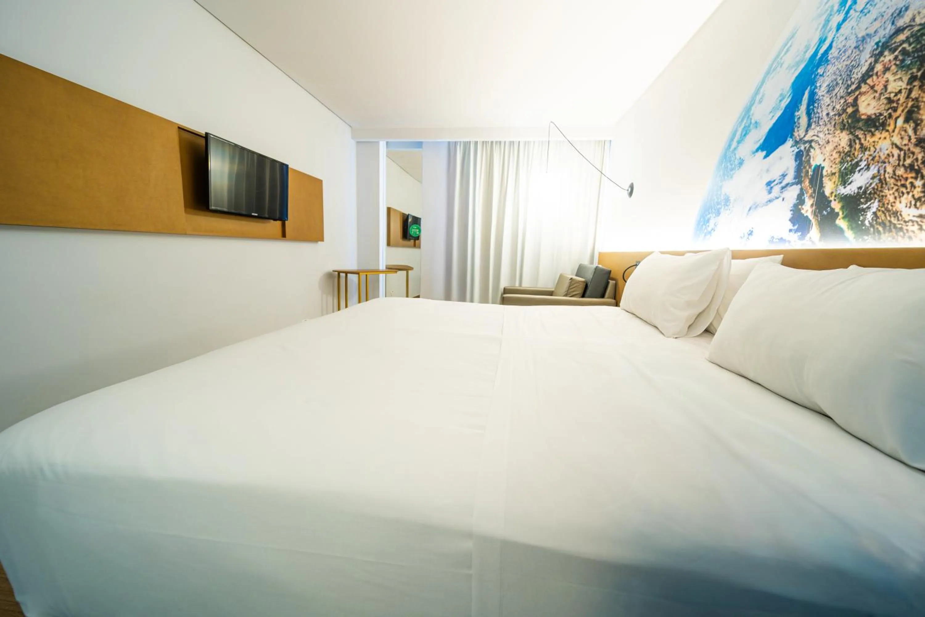 Bed in Hotel Euro Suite Curitiba Batel By Nacional Inn