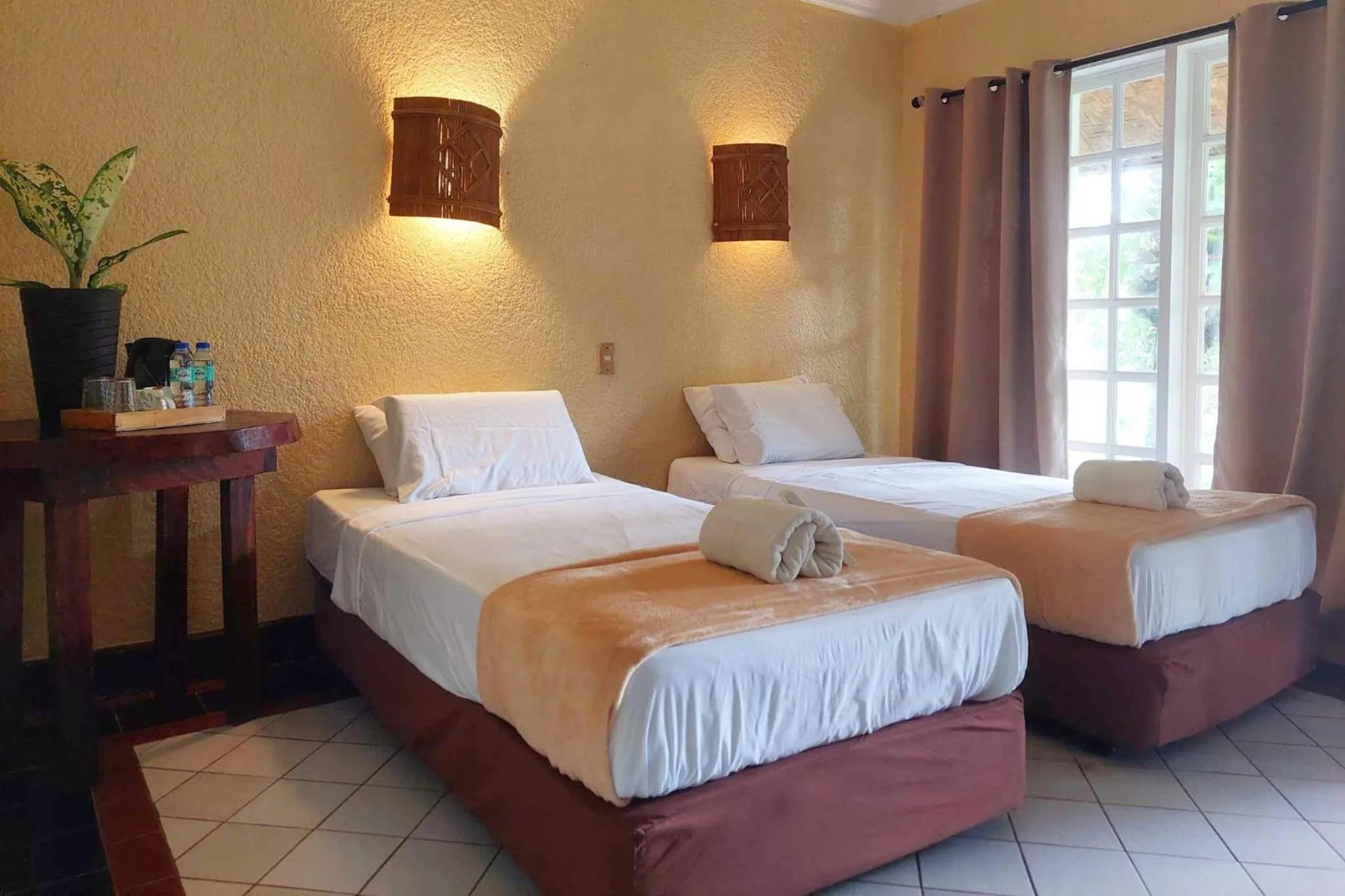 Bed in Estaca Bay Gardens Conference Resort powered by Cocotel