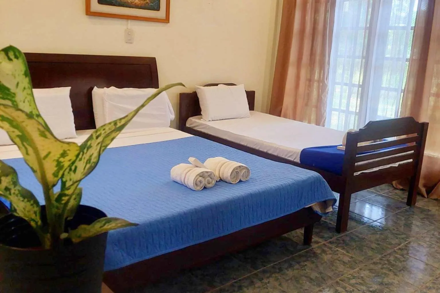 Bed in Estaca Bay Gardens Conference Resort powered by Cocotel