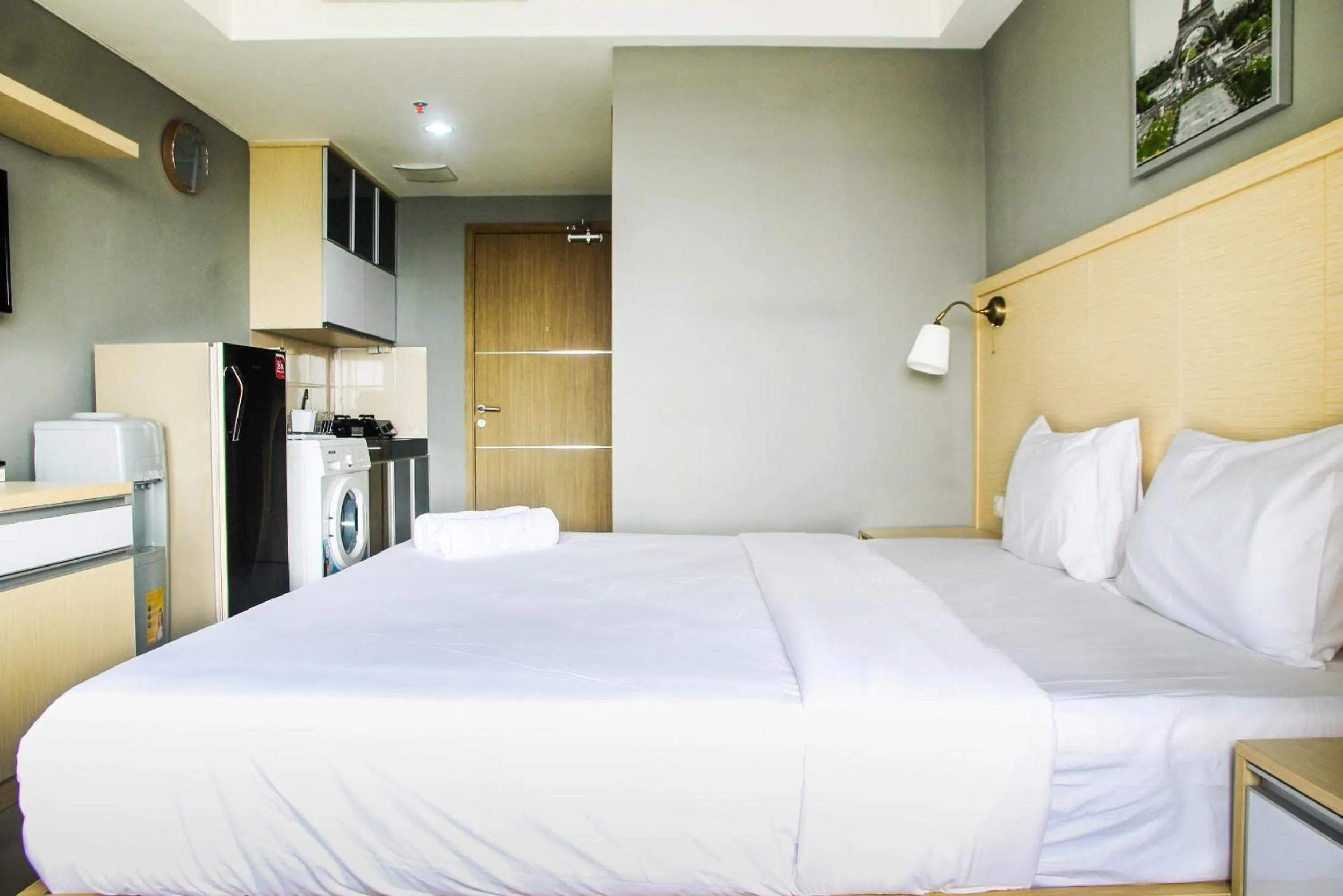 Bedroom in Modern and Cozy Studio Room The Oasis Cikarang Apartment By Travelio