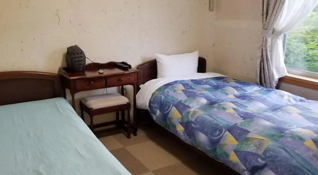 Twin Room with Shared Bathroom - single occupancy - Non Smoking in Oyado Raku Twin Room with Shared Bathroom - single occupancy - Non Smoking in Oyado Raku