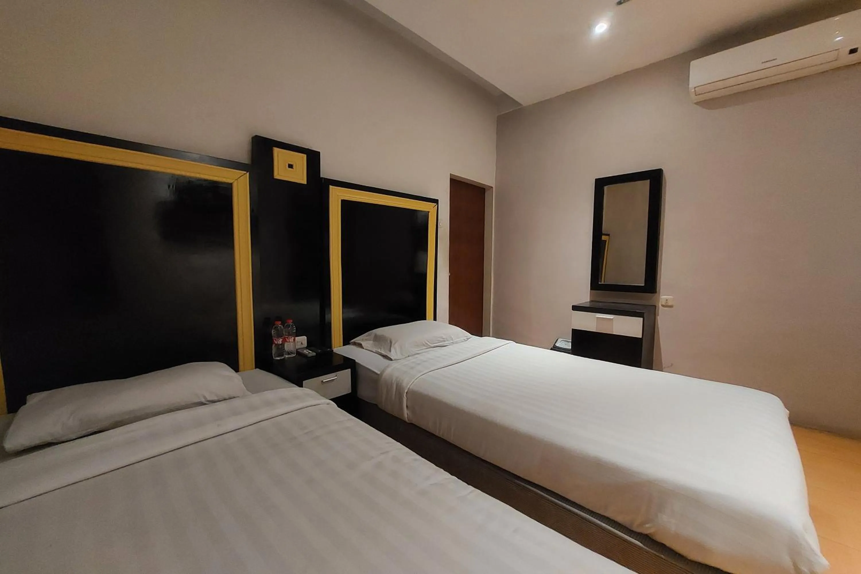 Bed in Hotel Bumi Malaya