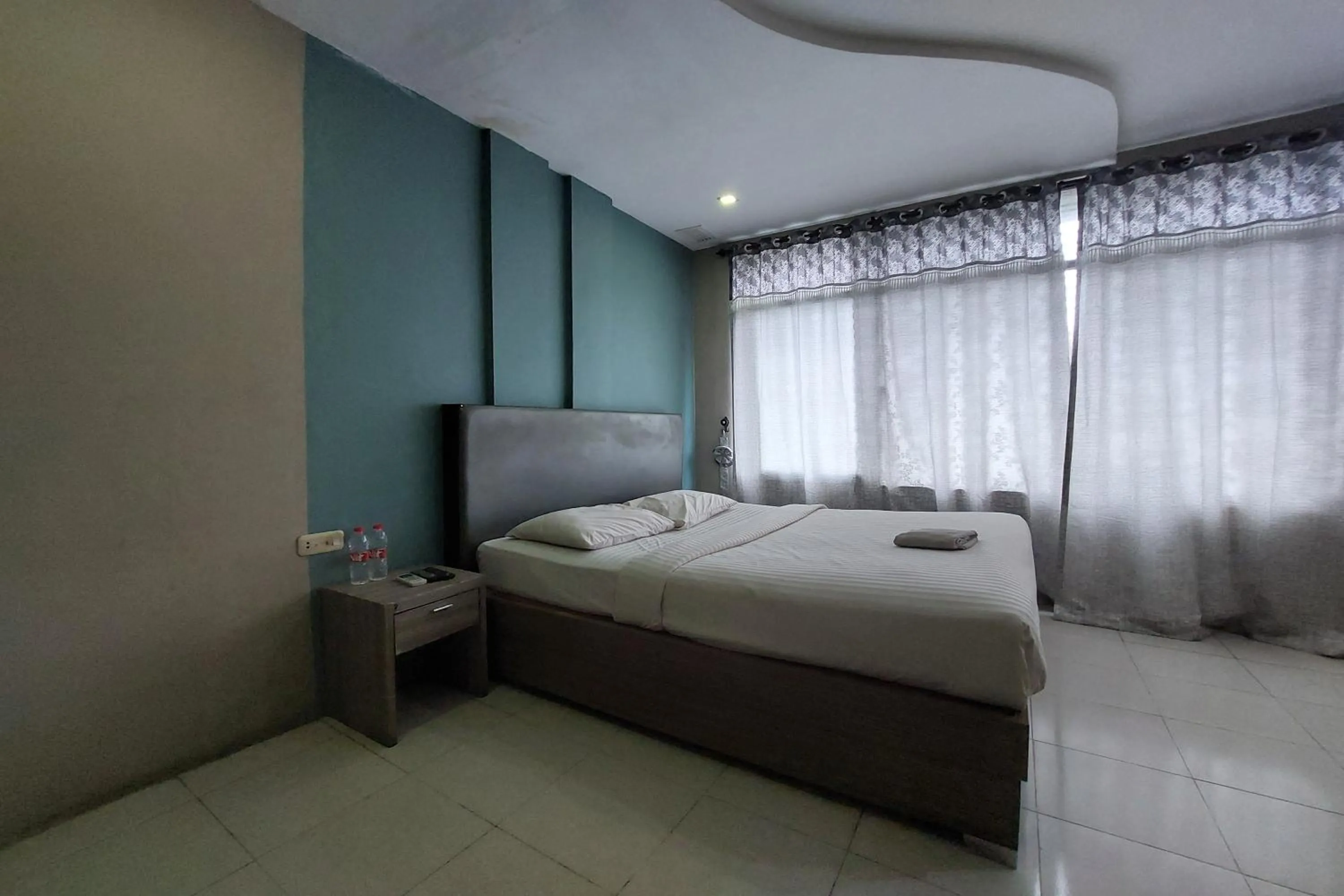 Bed in Hotel Bumi Malaya