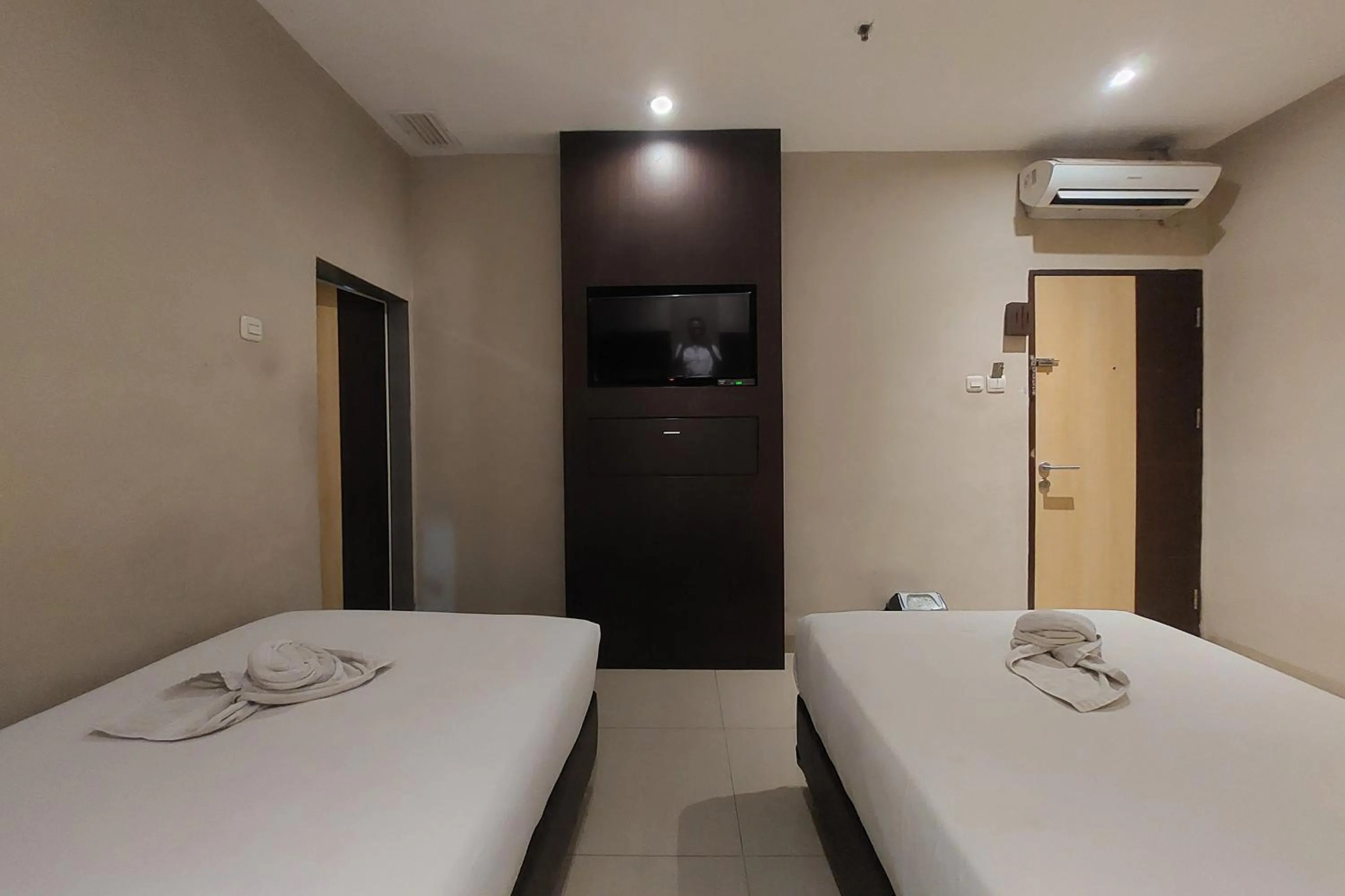 Bed in Hotel Bumi Malaya