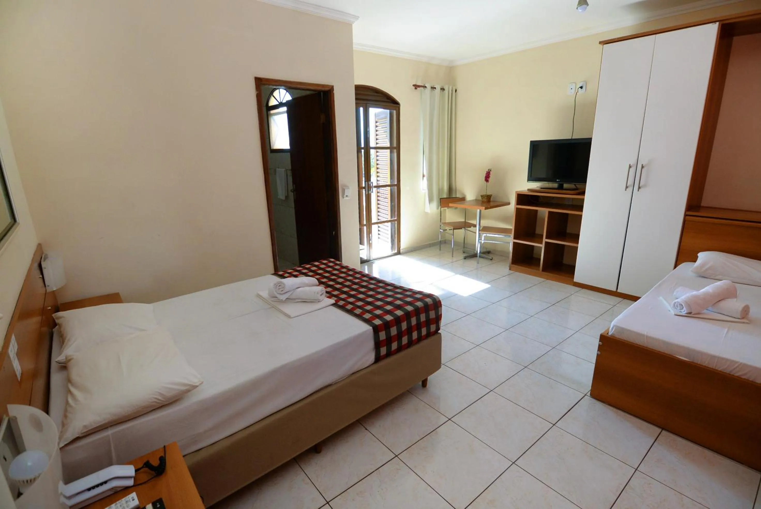 Photo of the whole room, Bed in Hotel Porto dos Milagres