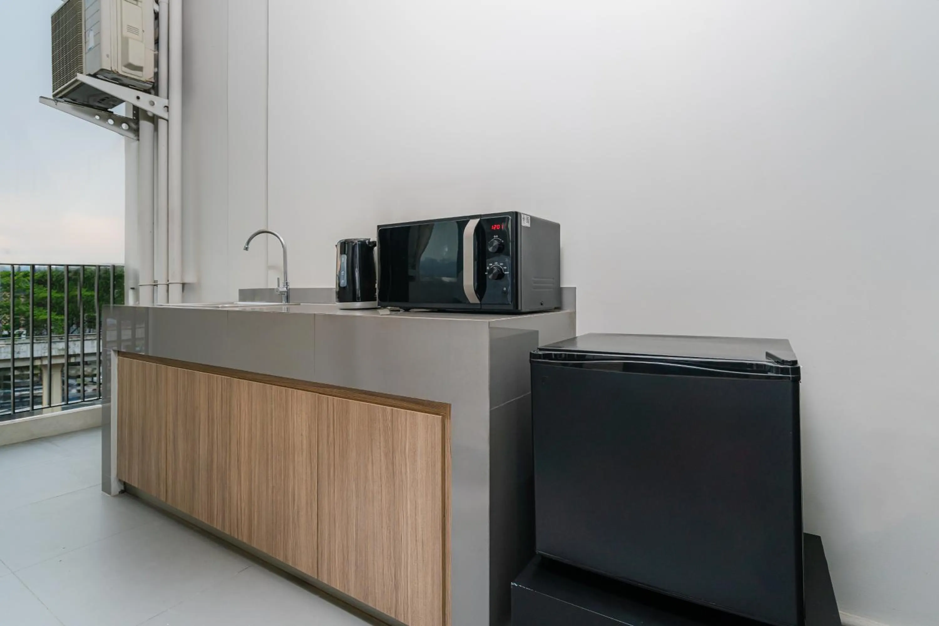 Kitchen or kitchenette in SureStay by Best Western Bangkok Ramintra