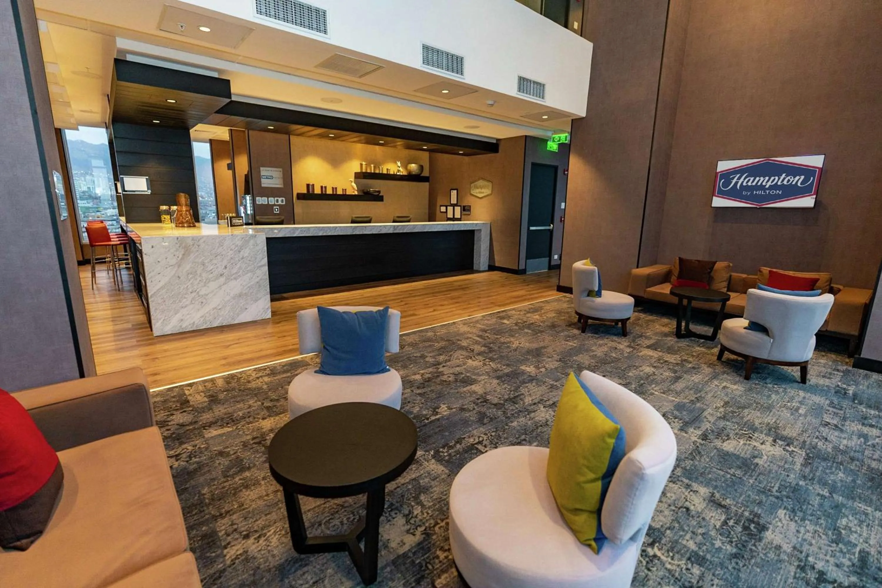 Communal lounge/ TV room in Hampton By Hilton Antofagasta