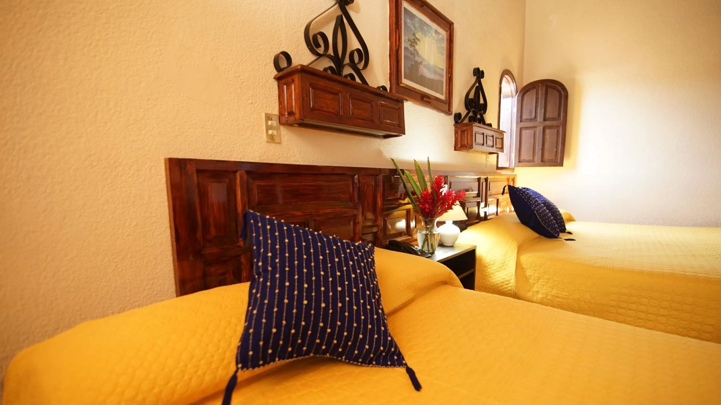 Bed in Hotel Palacio de Moctezuma