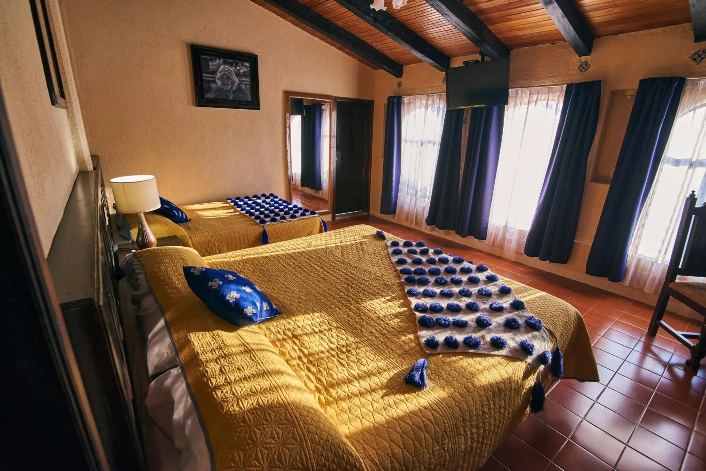 Bed in Hotel Palacio de Moctezuma