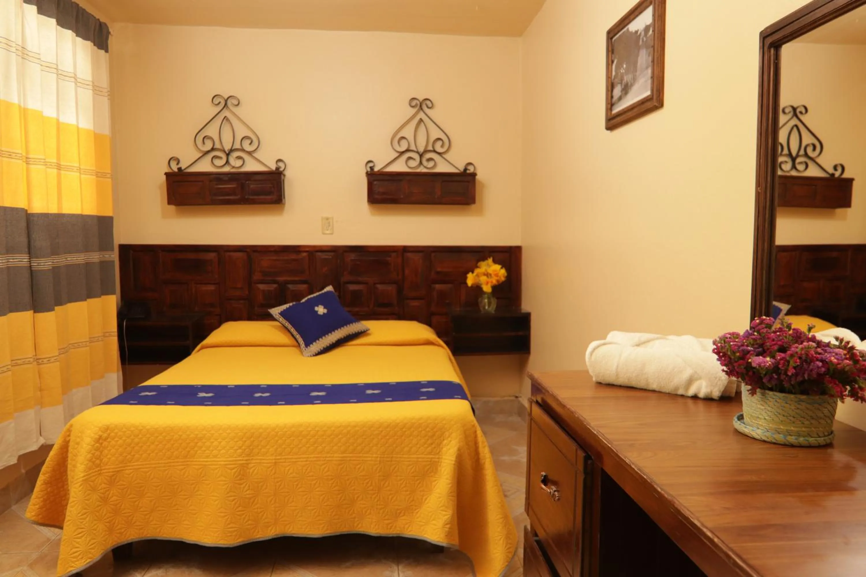 Bed in Hotel Palacio de Moctezuma