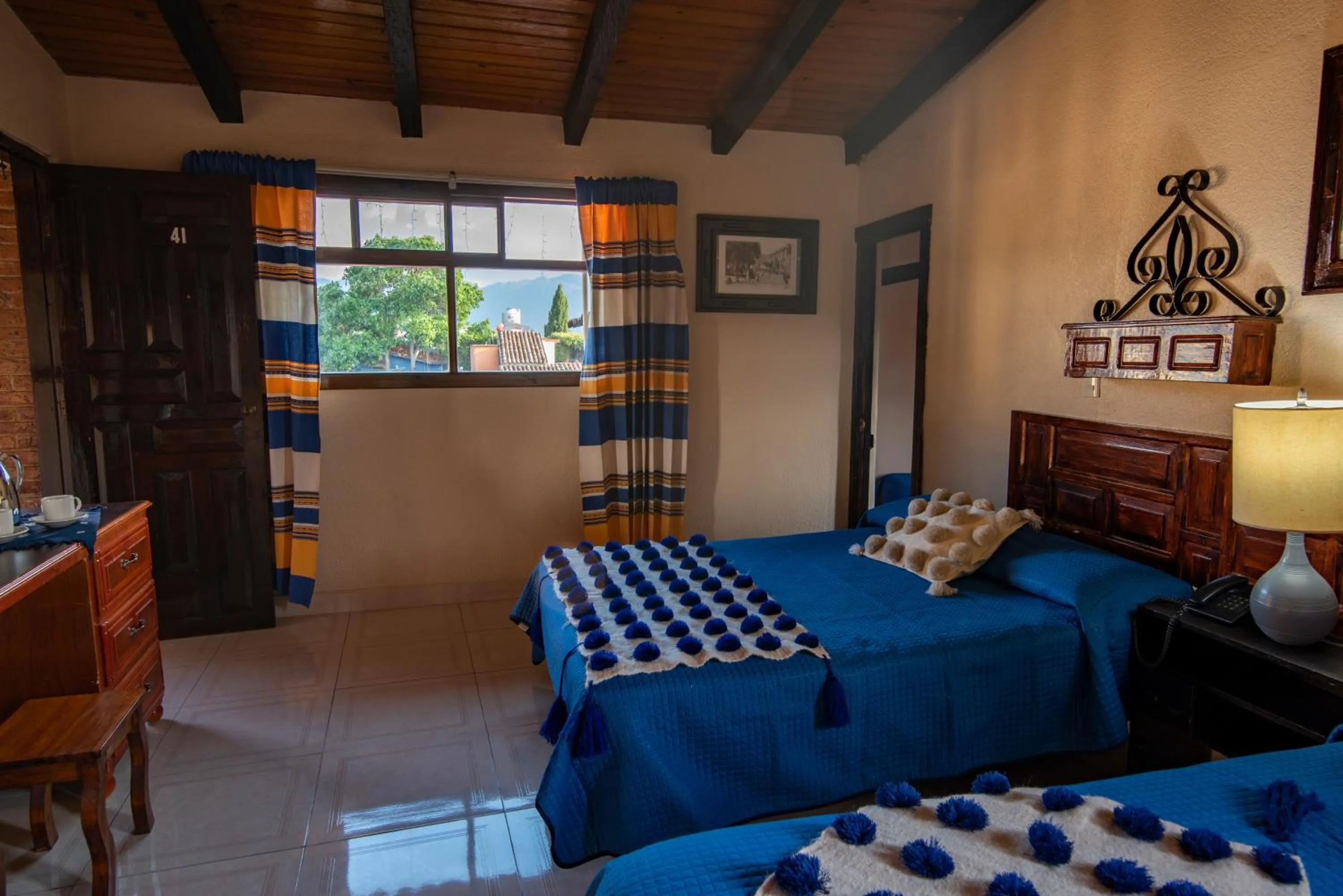 Bed in Hotel Palacio de Moctezuma