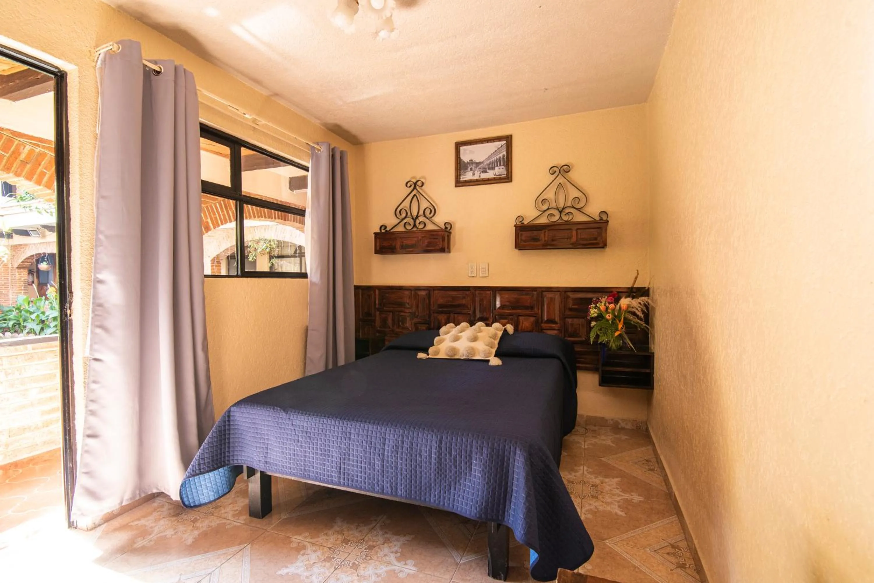 Bed in Hotel Palacio de Moctezuma