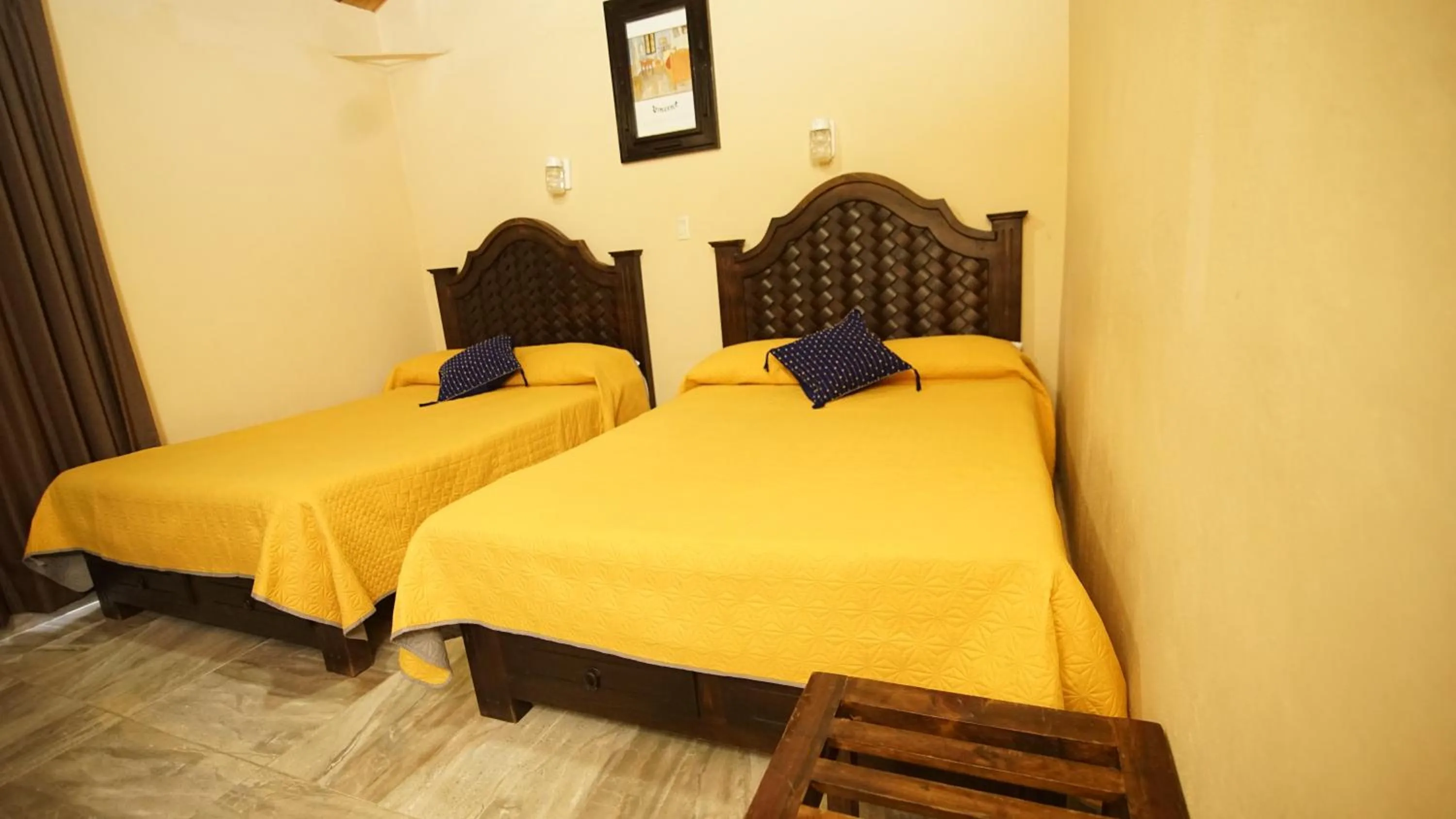 Bed in Hotel Palacio de Moctezuma