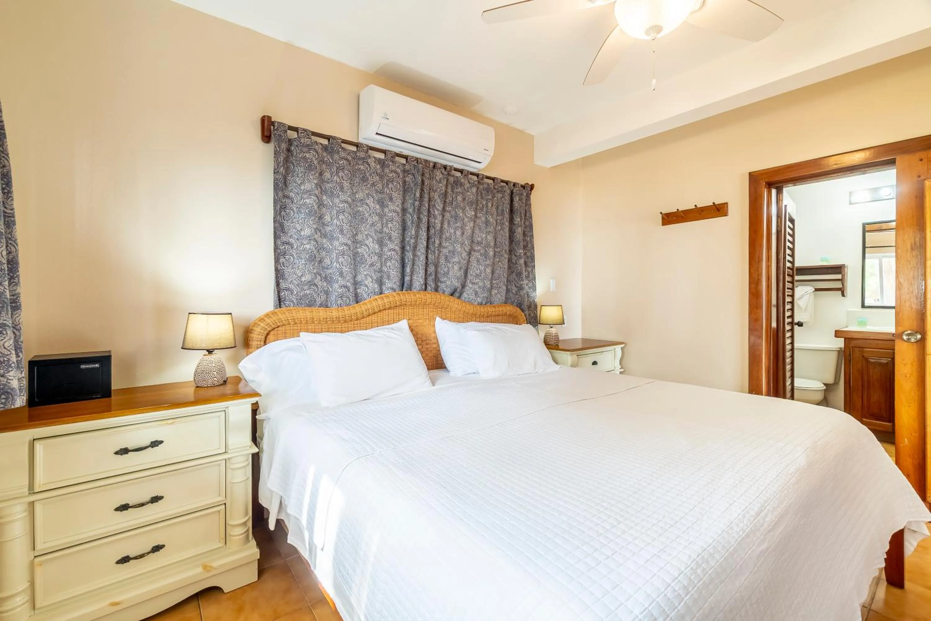 Bed in Caribbean Villas Hotel