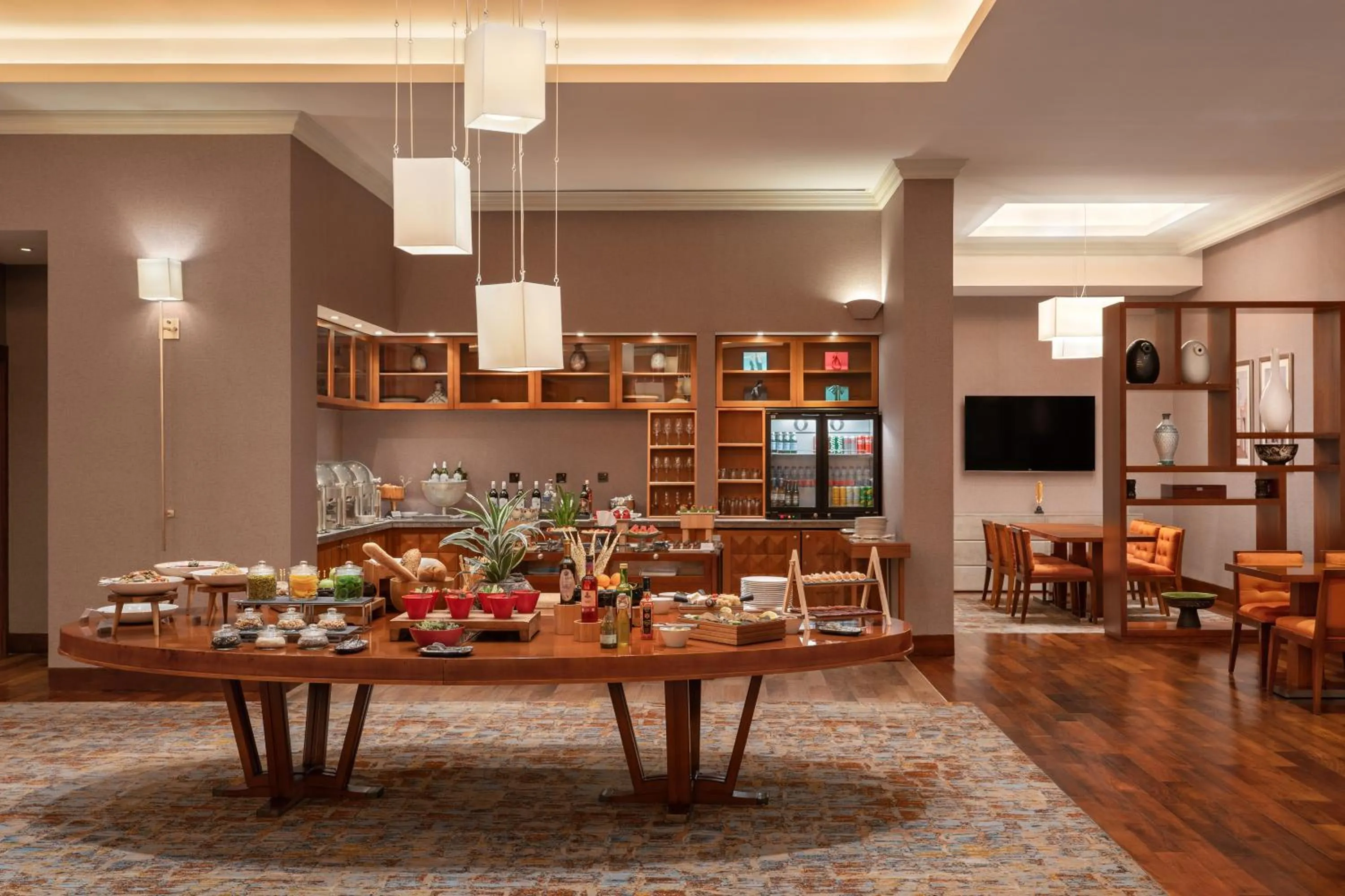 Communal lounge/ TV room in Grand Hyatt Doha Hotel & Villas