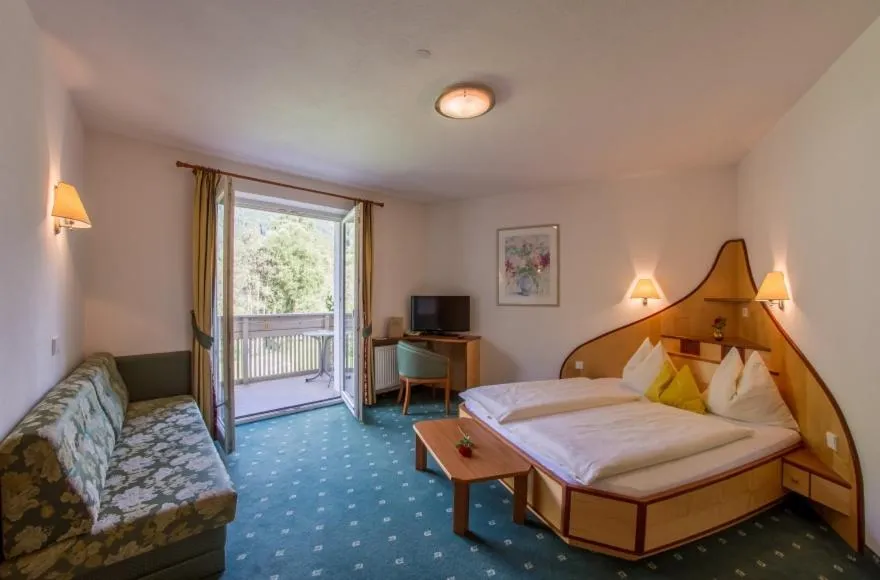 Bed in Appartement Hotel Erlhof Deluxe