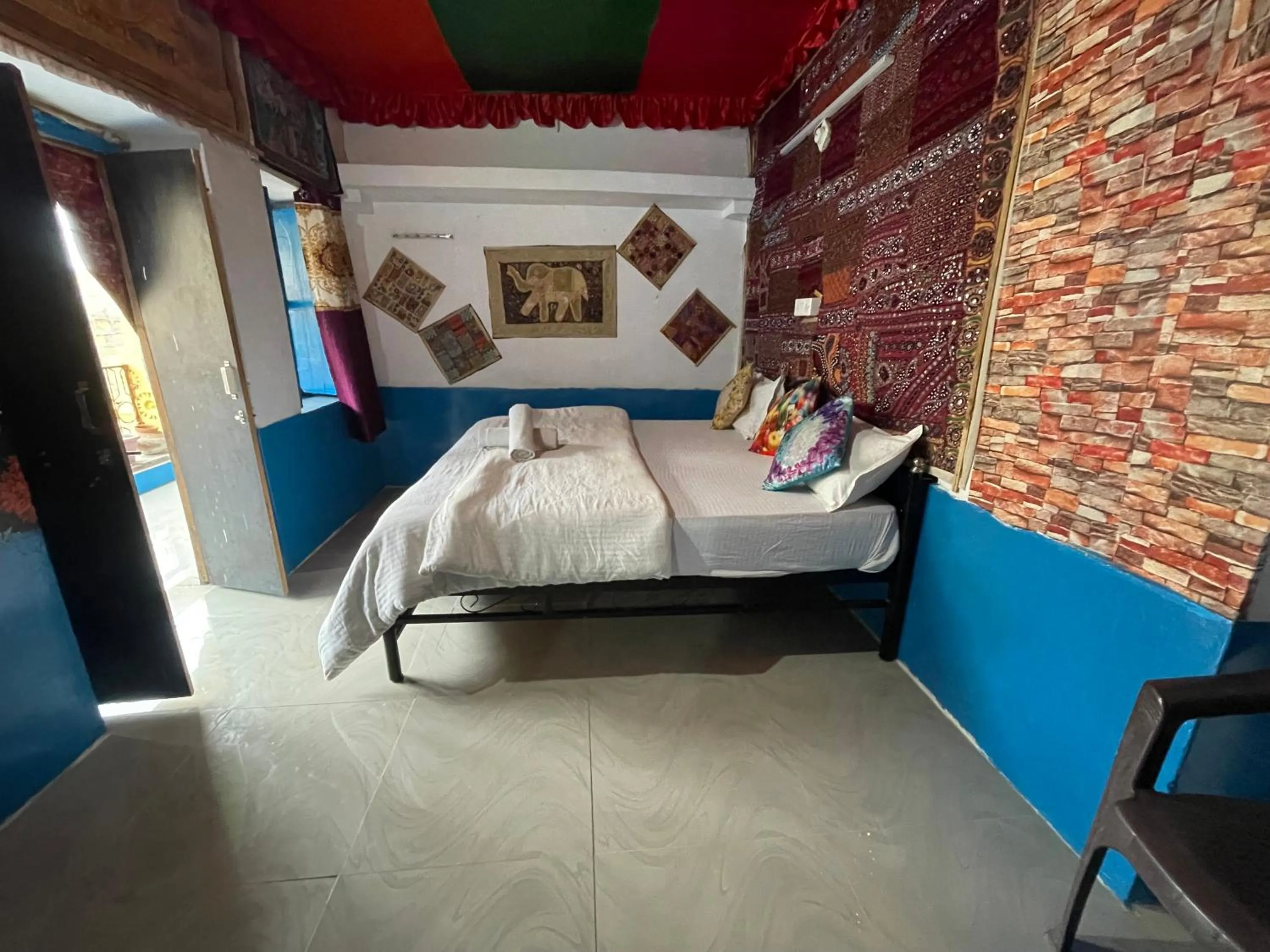 Bed in Mirvana Guest House & Camel safari