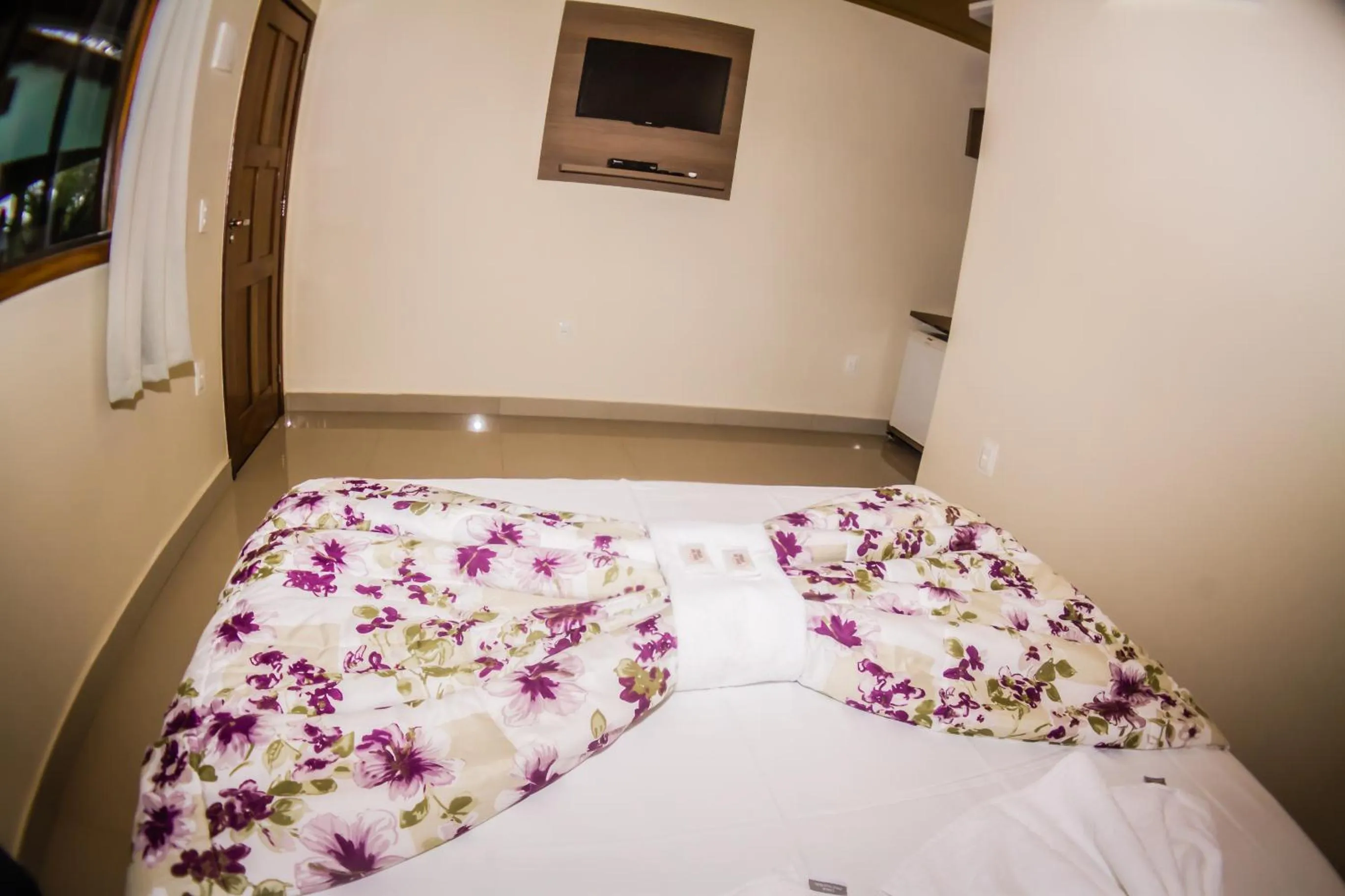 Bed in Pousada dos Guias