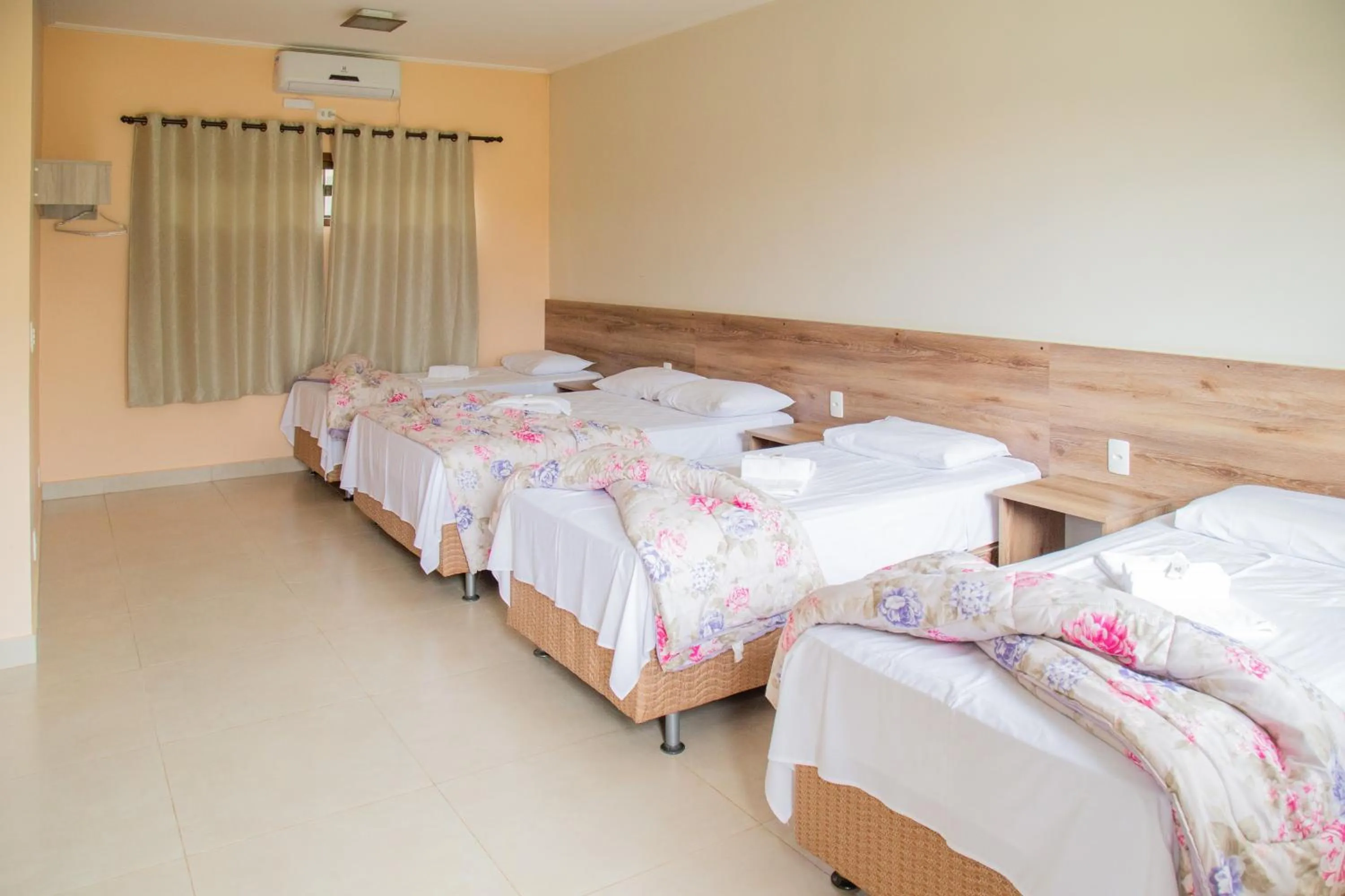 Bed in Pousada dos Guias