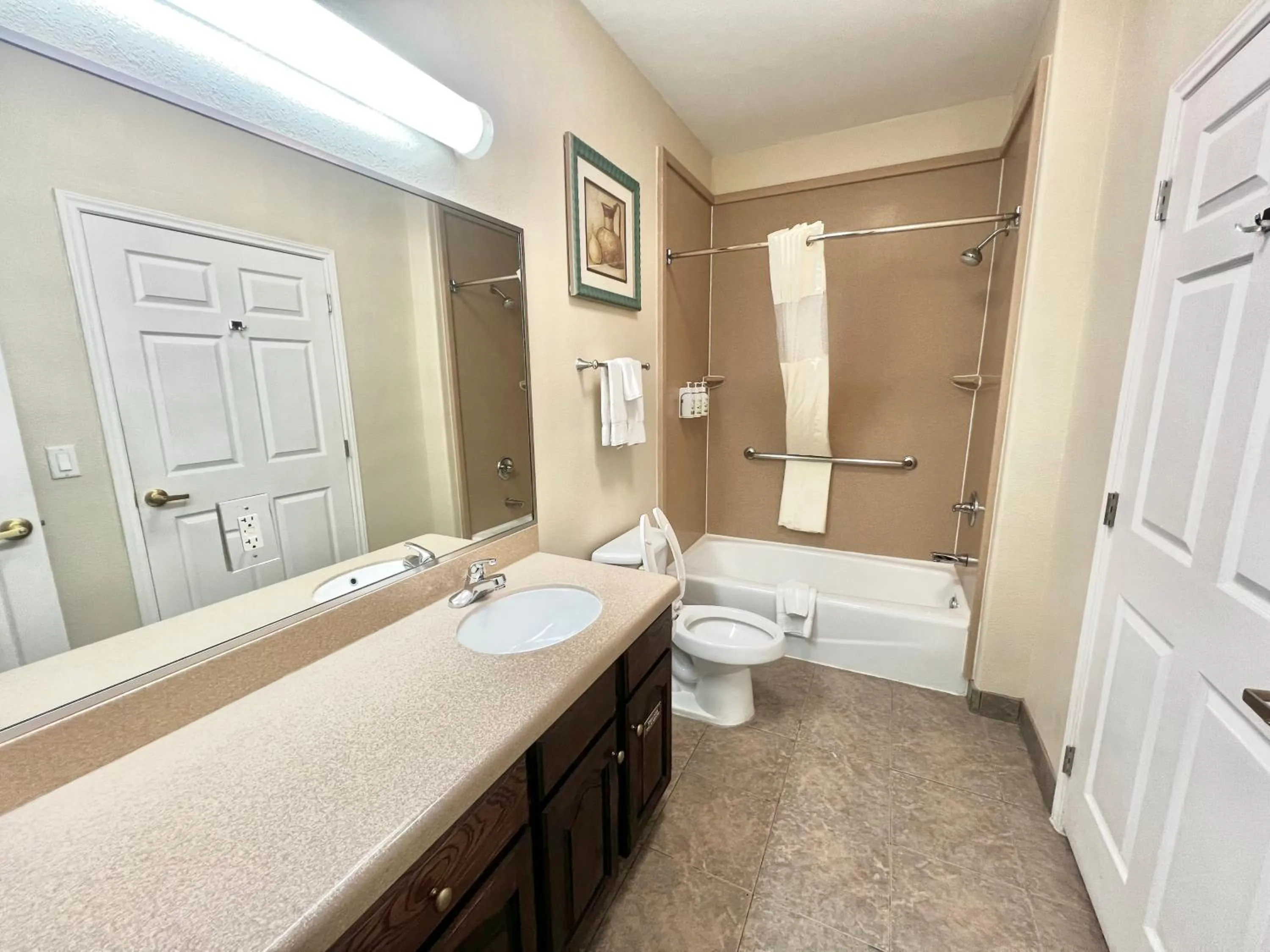 Toilet in La Quinta Inn & Suites by Wyndham Pharr RGV Medical Center