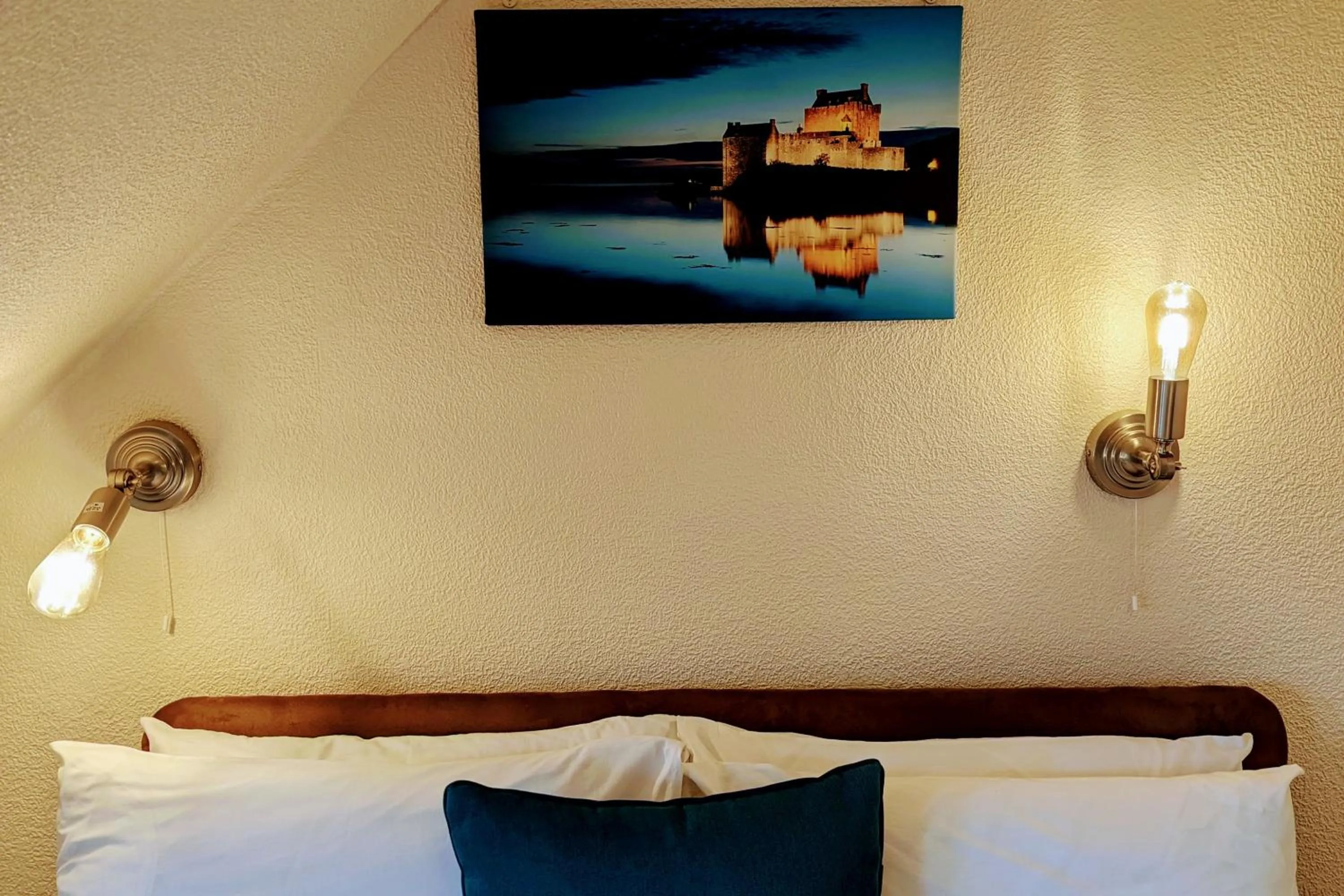 Bed in The Coo's Guest House