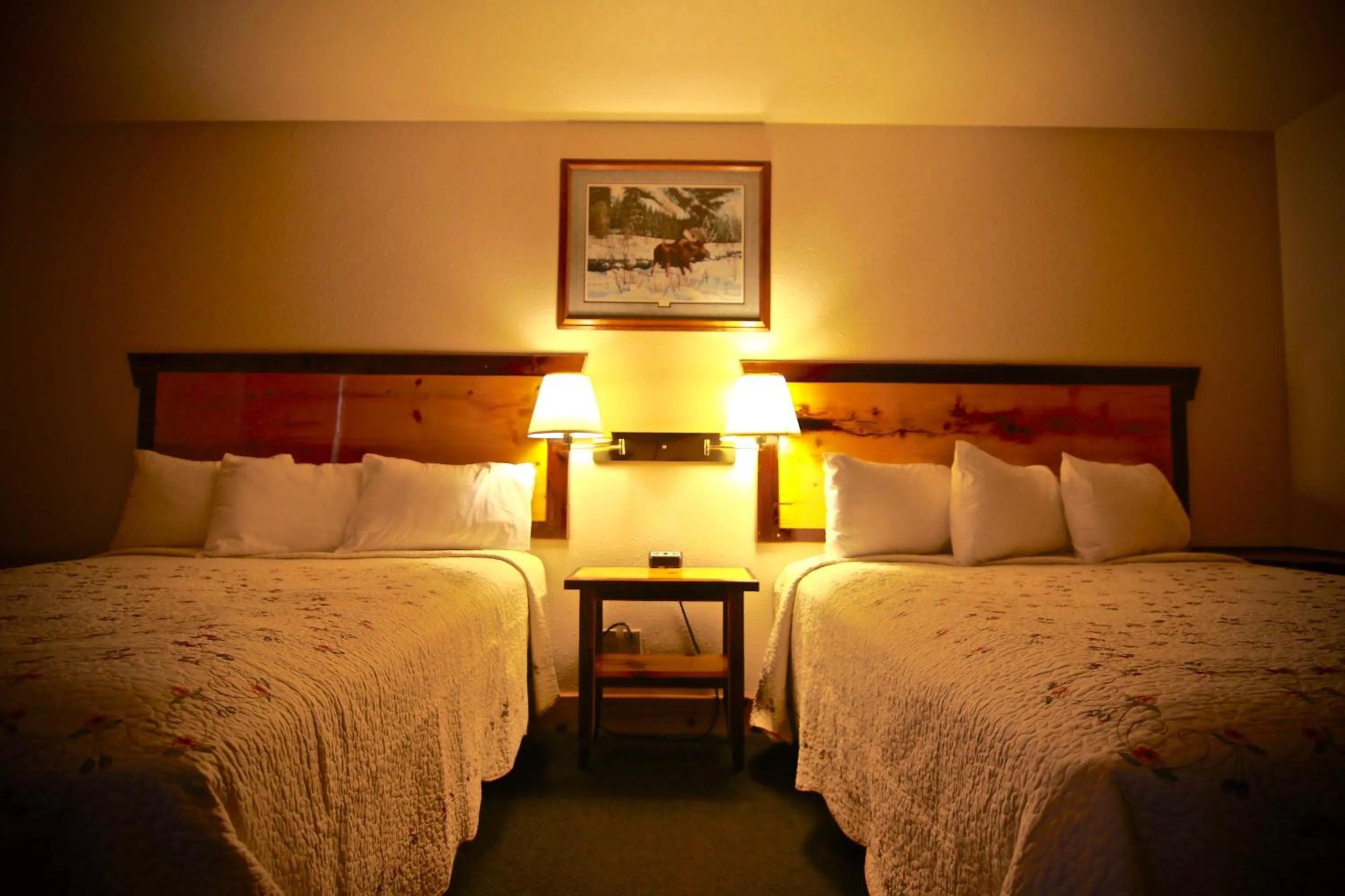 Bed in Yellowstone Village Inn and Suites
