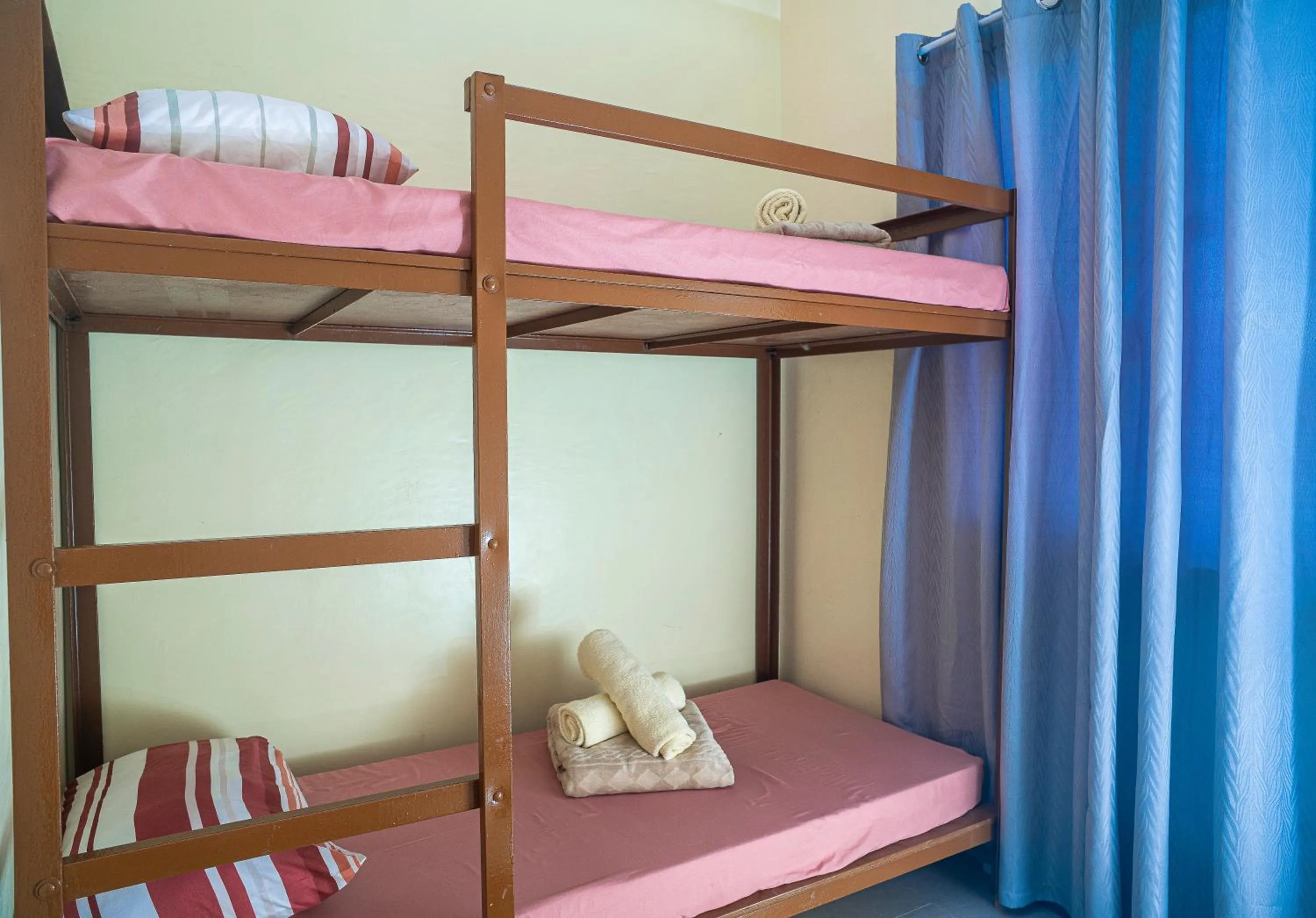 Bed in Panglao Village Court Apartment Stay Inn