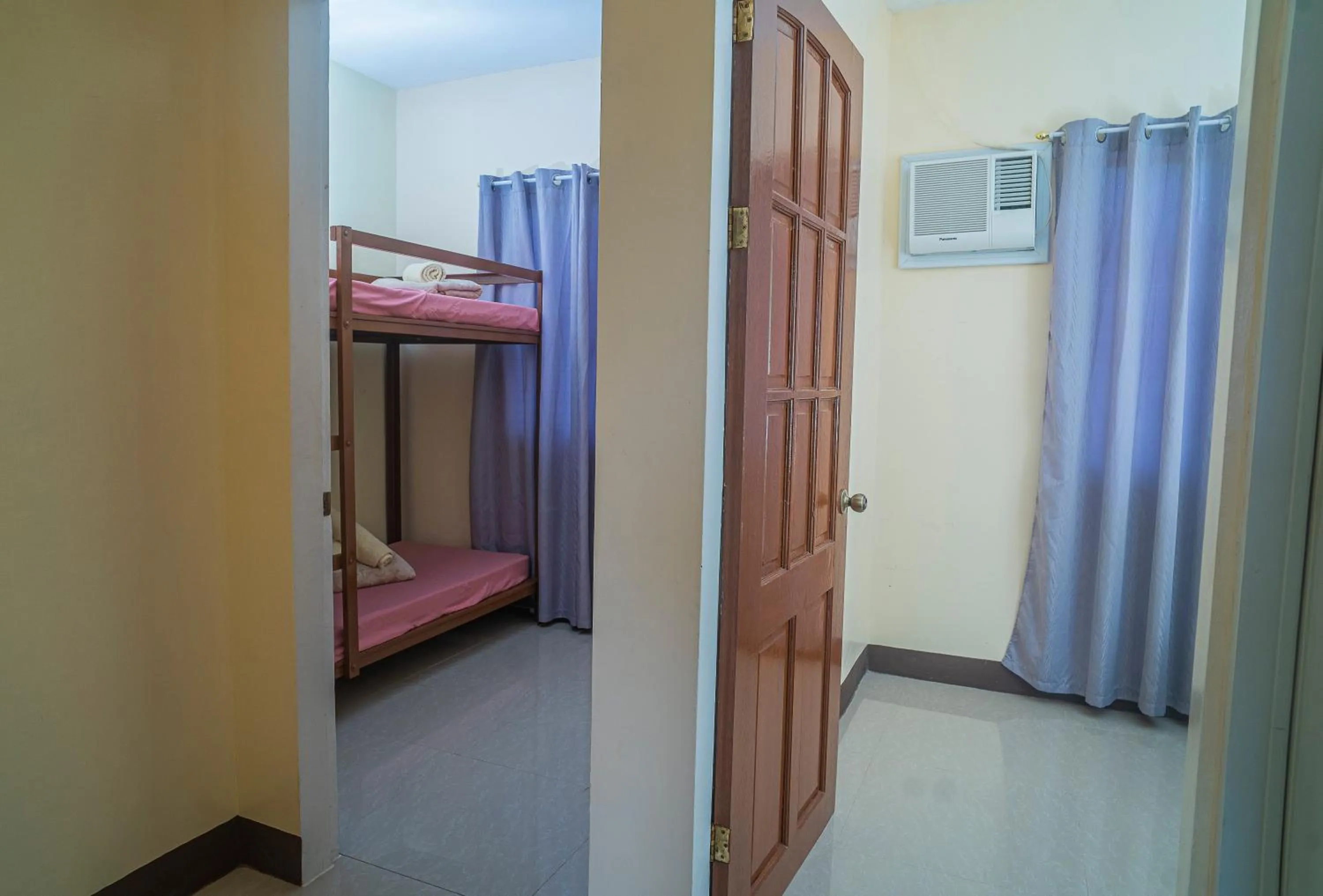 Bed in Panglao Village Court Apartment Stay Inn