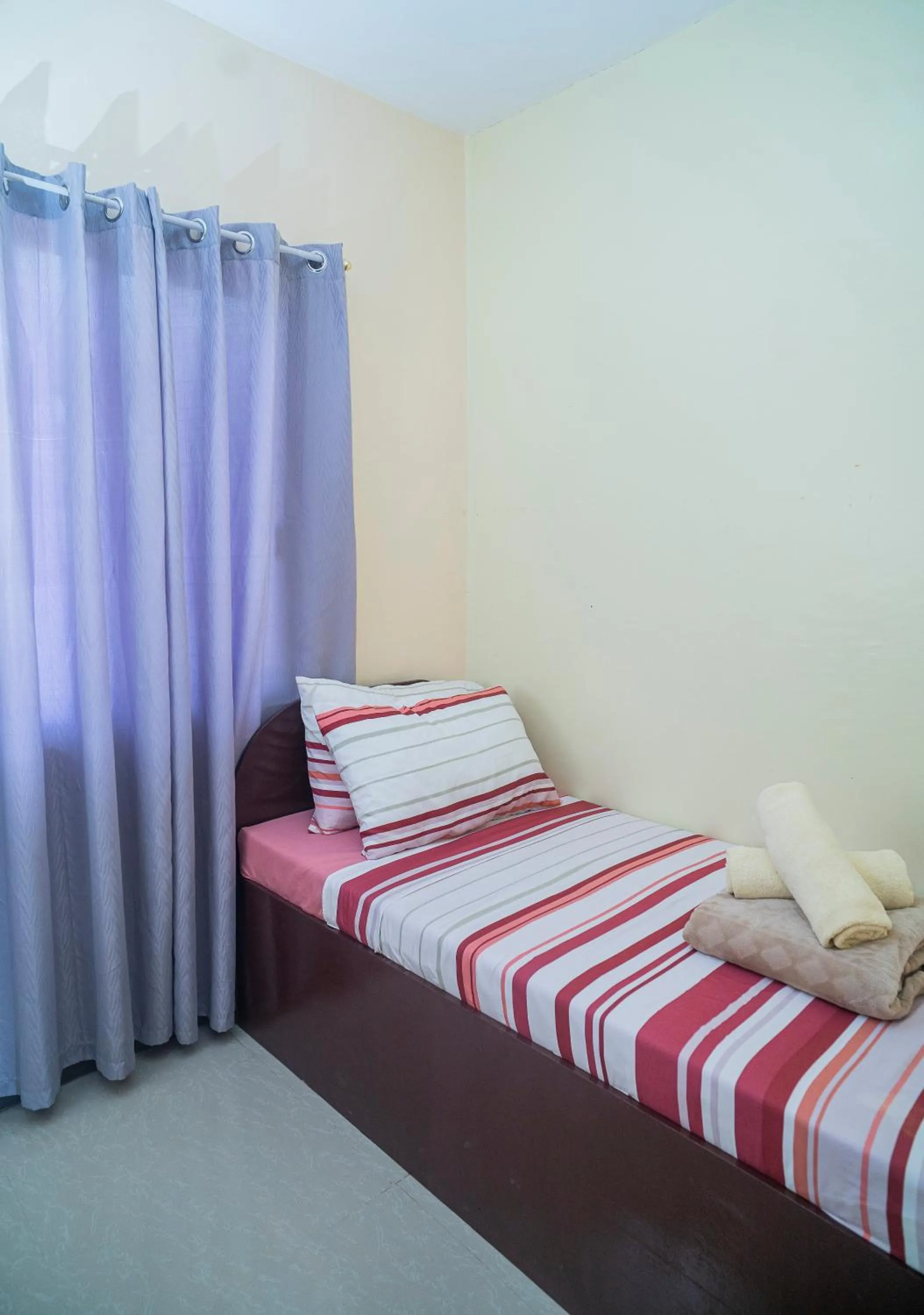 Bed in Panglao Village Court Apartment Stay Inn