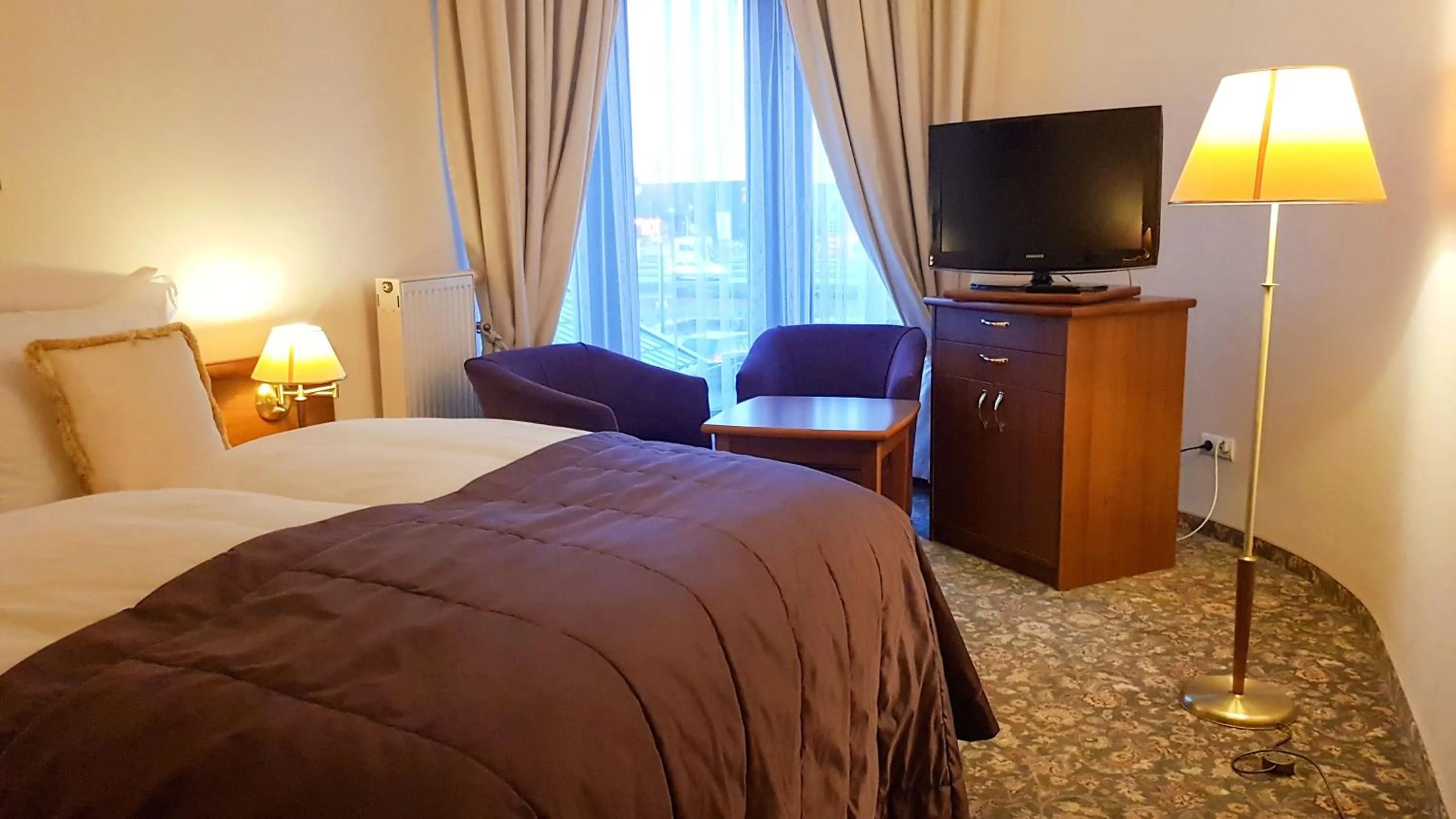 Bed in Hotel Amaryllis