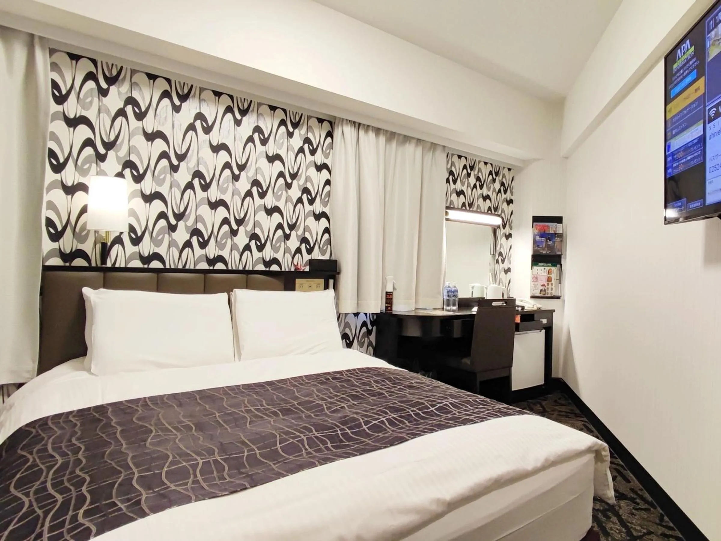 Photo of the whole room, Bed in APA Hotel Niigata