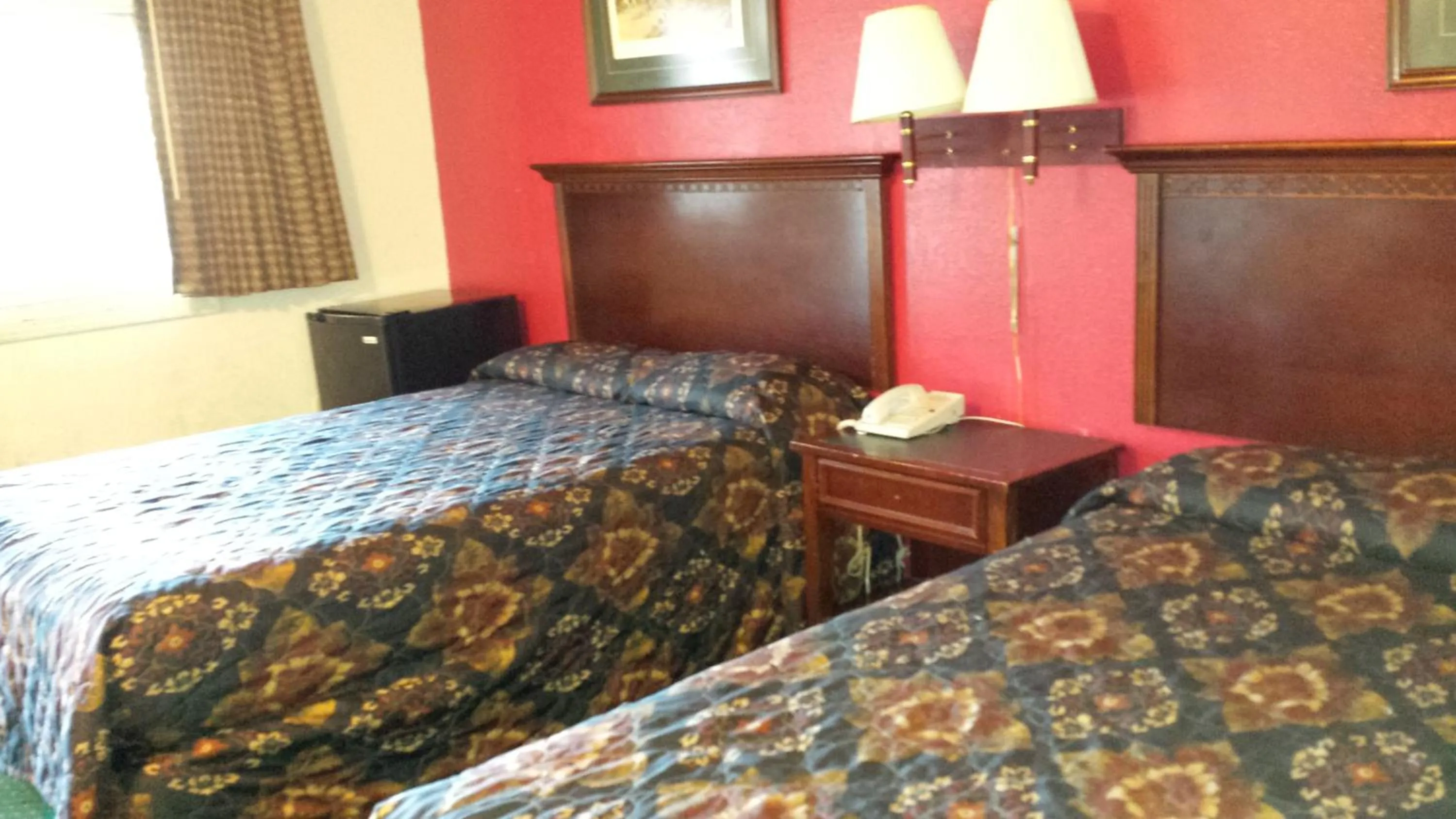 Bed in Hallmark Motel