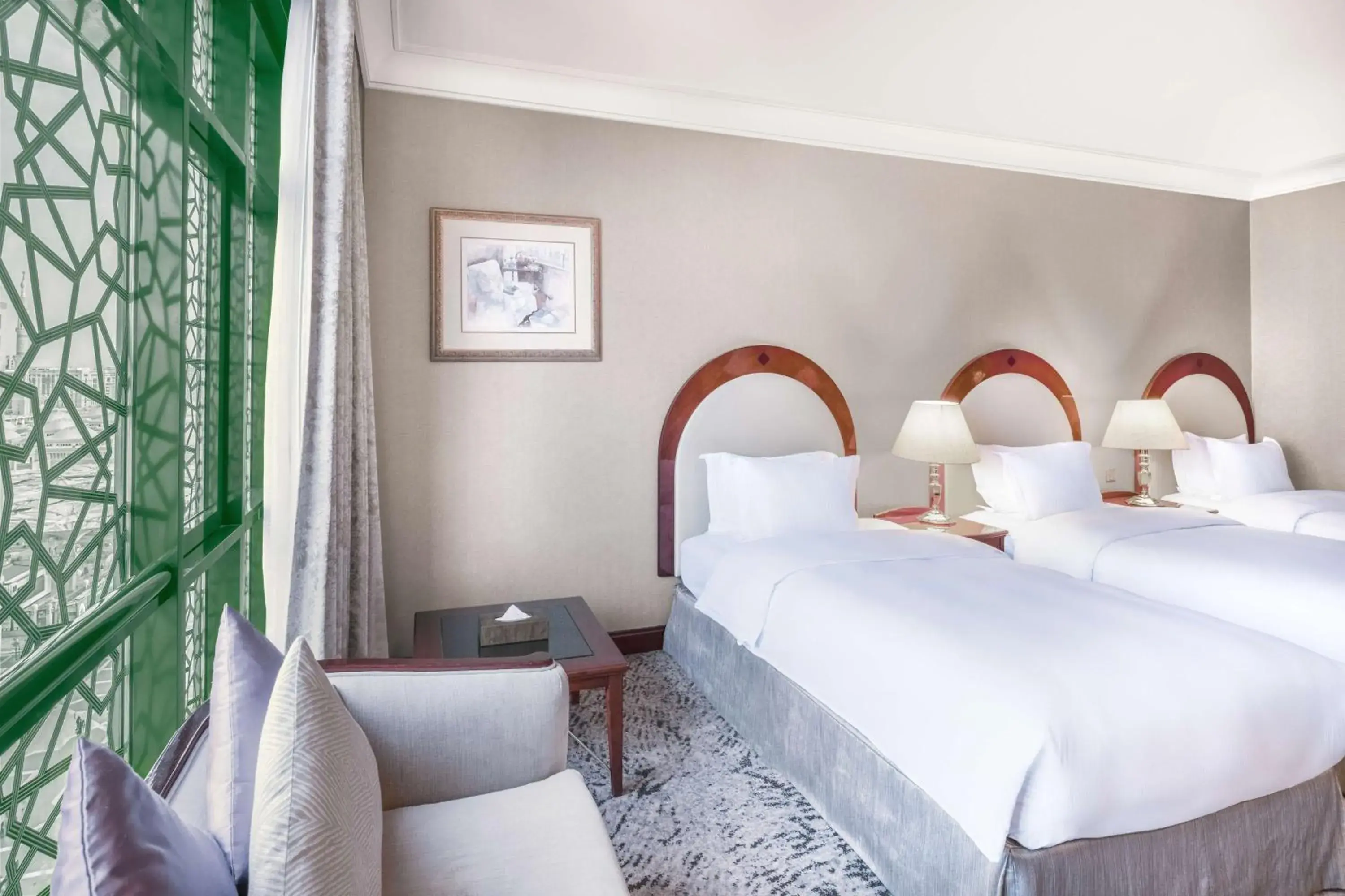 Deluxe Room Three Bed with Partial Haram View in Madinah Hilton Hotel Deluxe Room Three Bed with Partial Haram View in Madinah Hilton Hotel