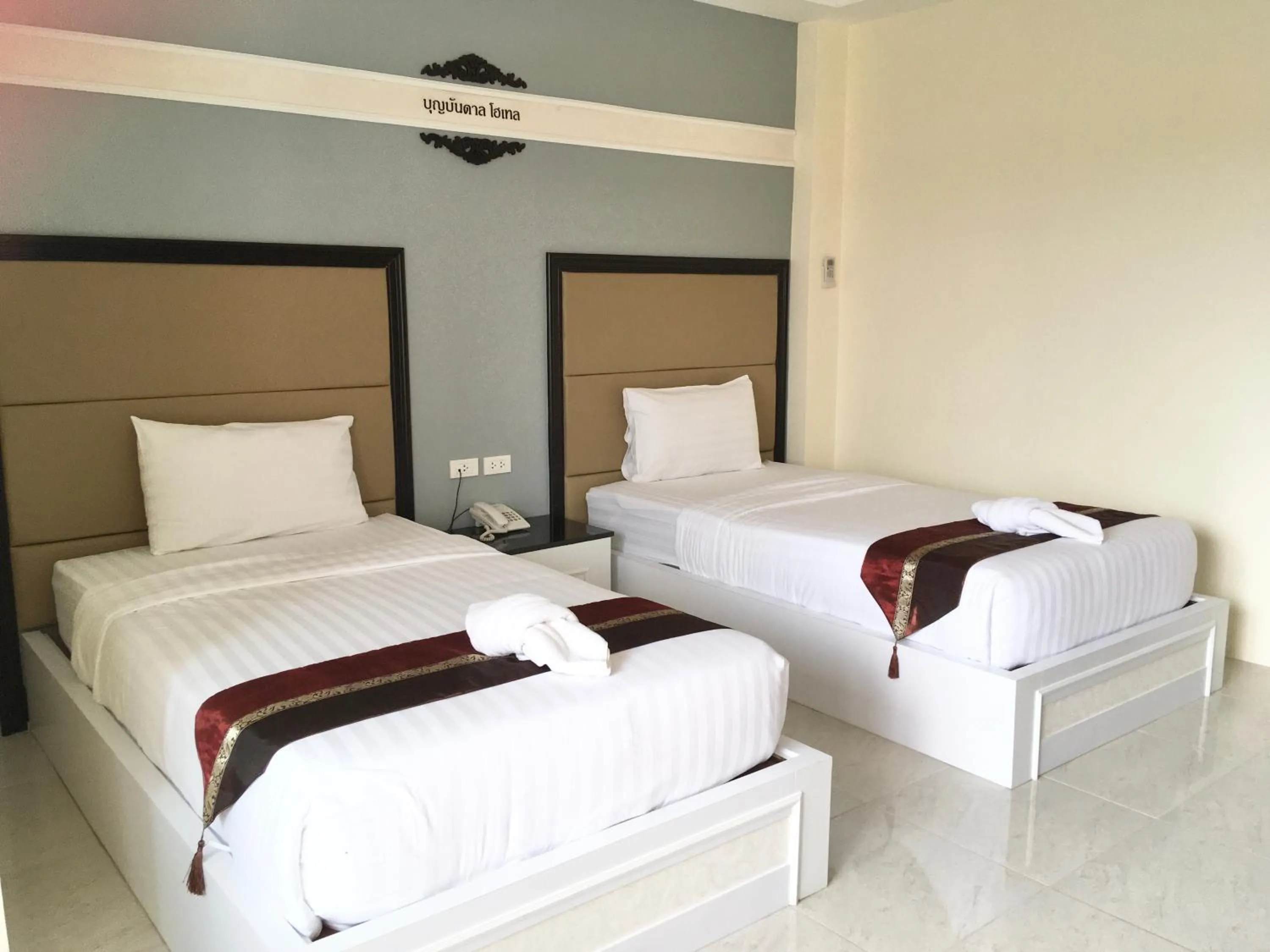 Bed in Boonbundal Hotel