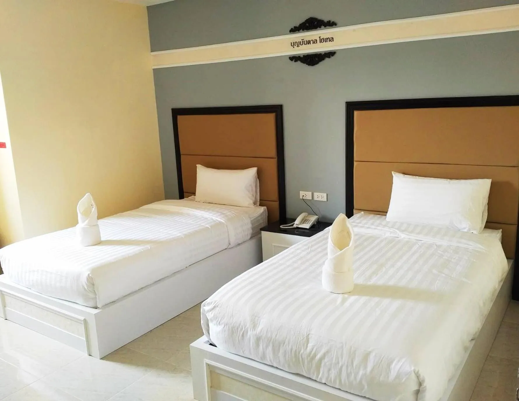 Bed in Boonbundal Hotel