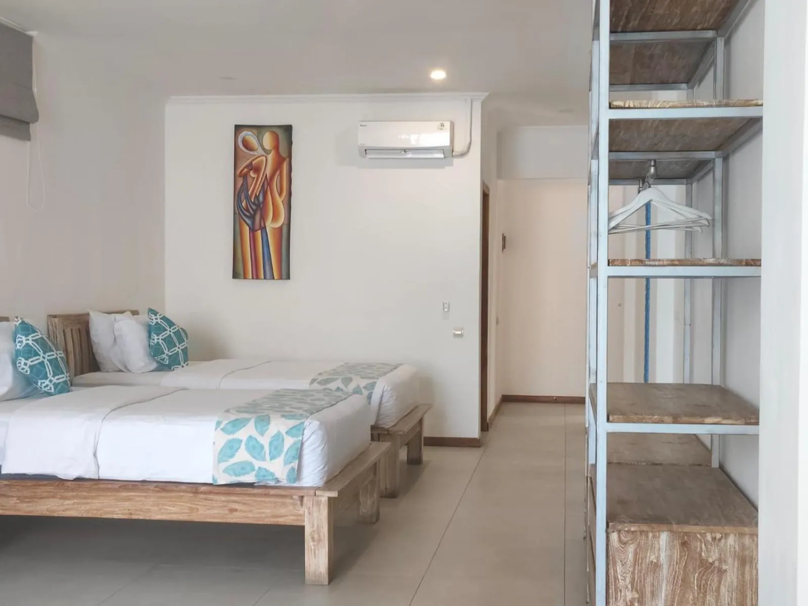 Bed in Triple 8 Suites