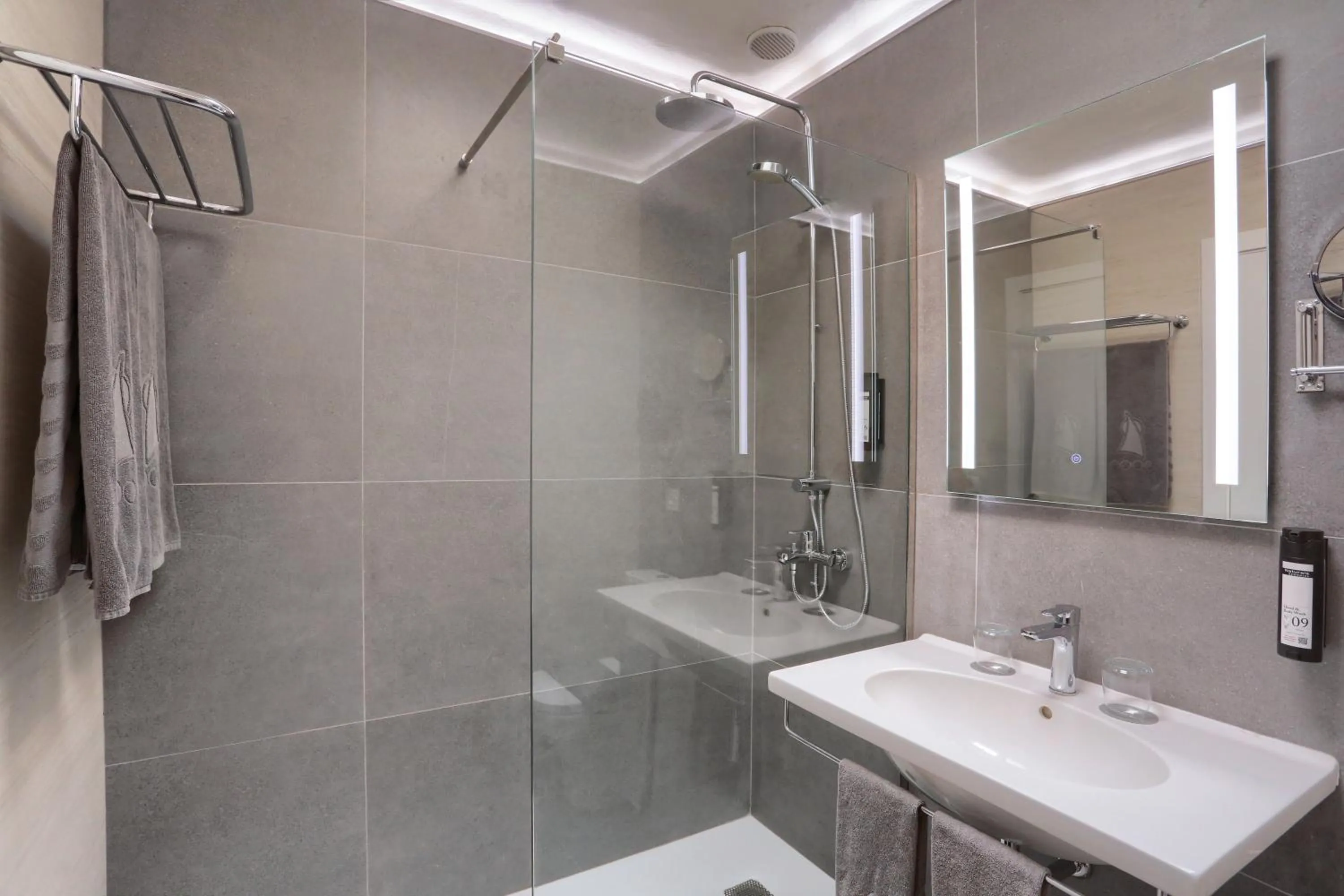 Shower in Apartamentos Garden & Sea Boutique Lodging by LIVVO