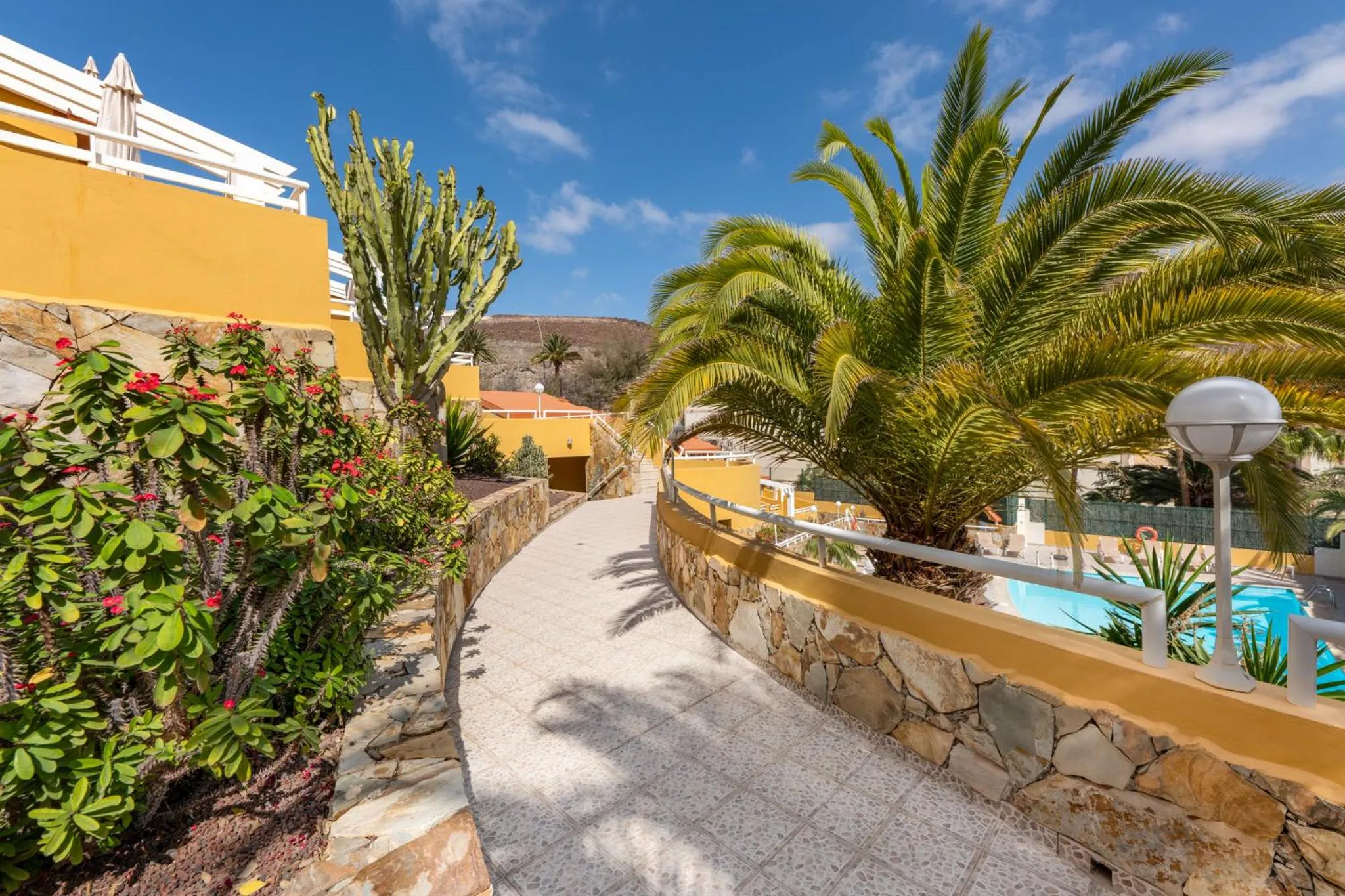 Garden in Apartamentos Punta Marina by LIVVO